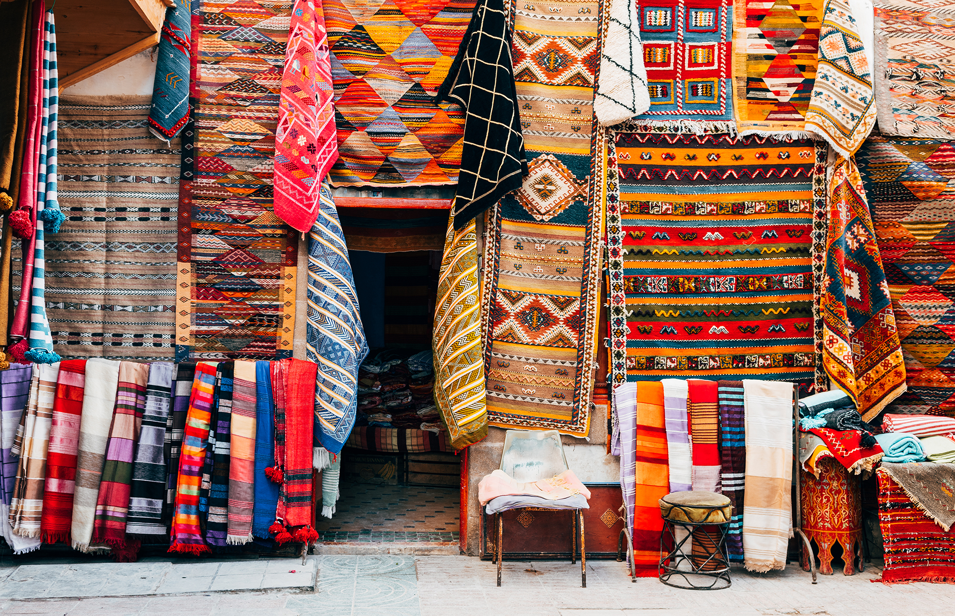 Carpets in a souk in Marrakech (Image: jon Chica/Shutterstock)