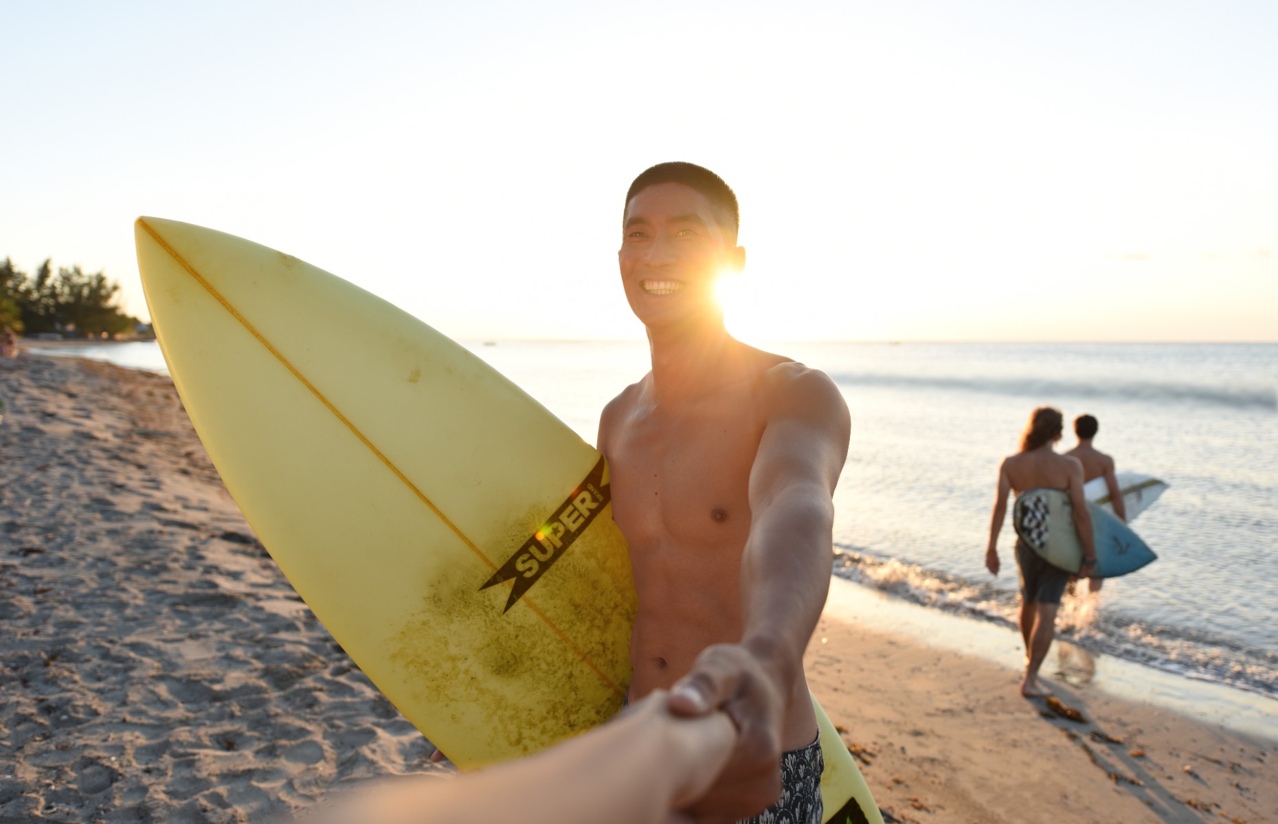 Surfing on Le Tamarin Bay, Mauritius. Image: Veranda Resorts