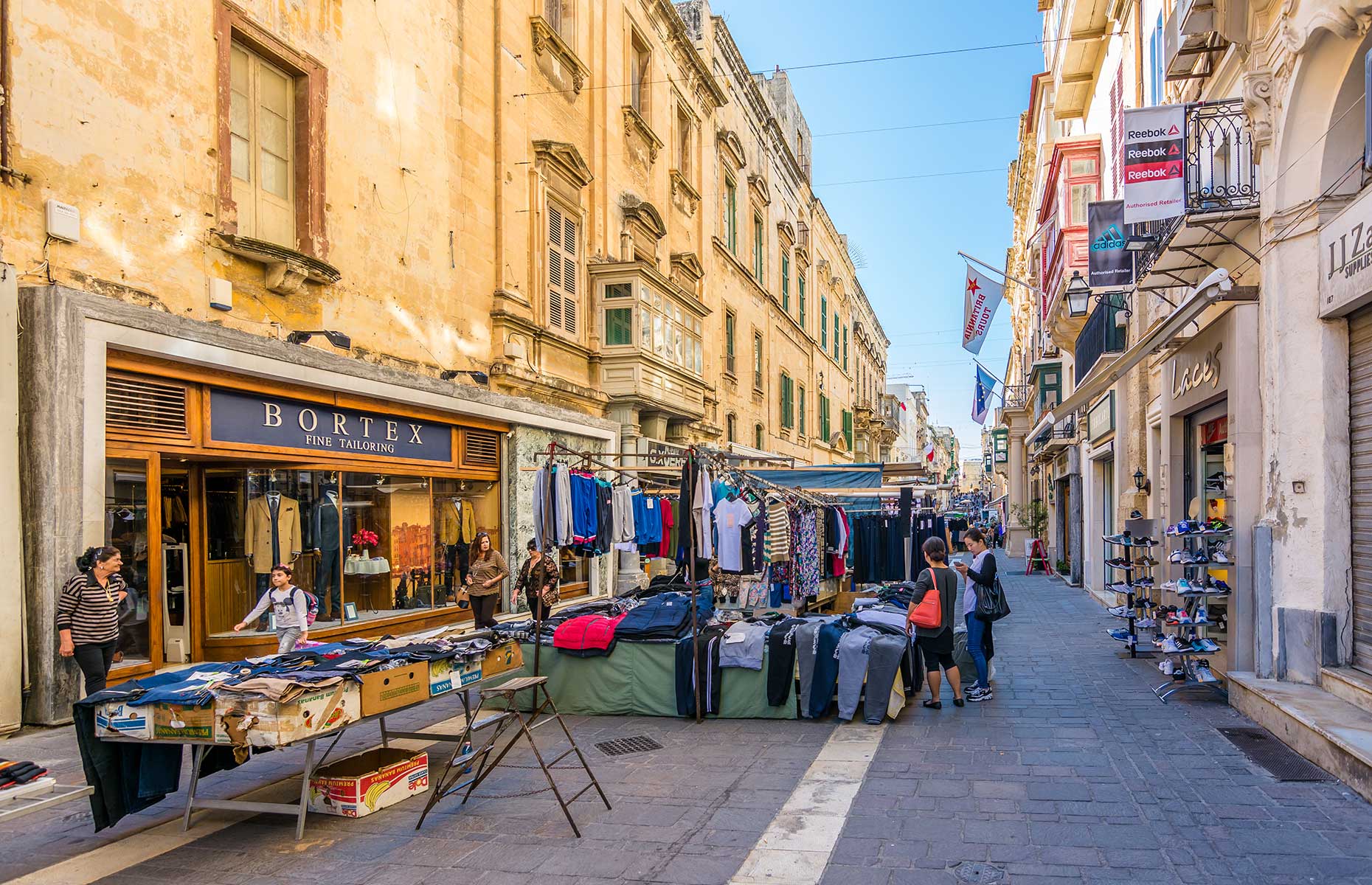 People shopping at local market in Valletta, Malta (Image: Nejdet Duzen/Shutterstock)