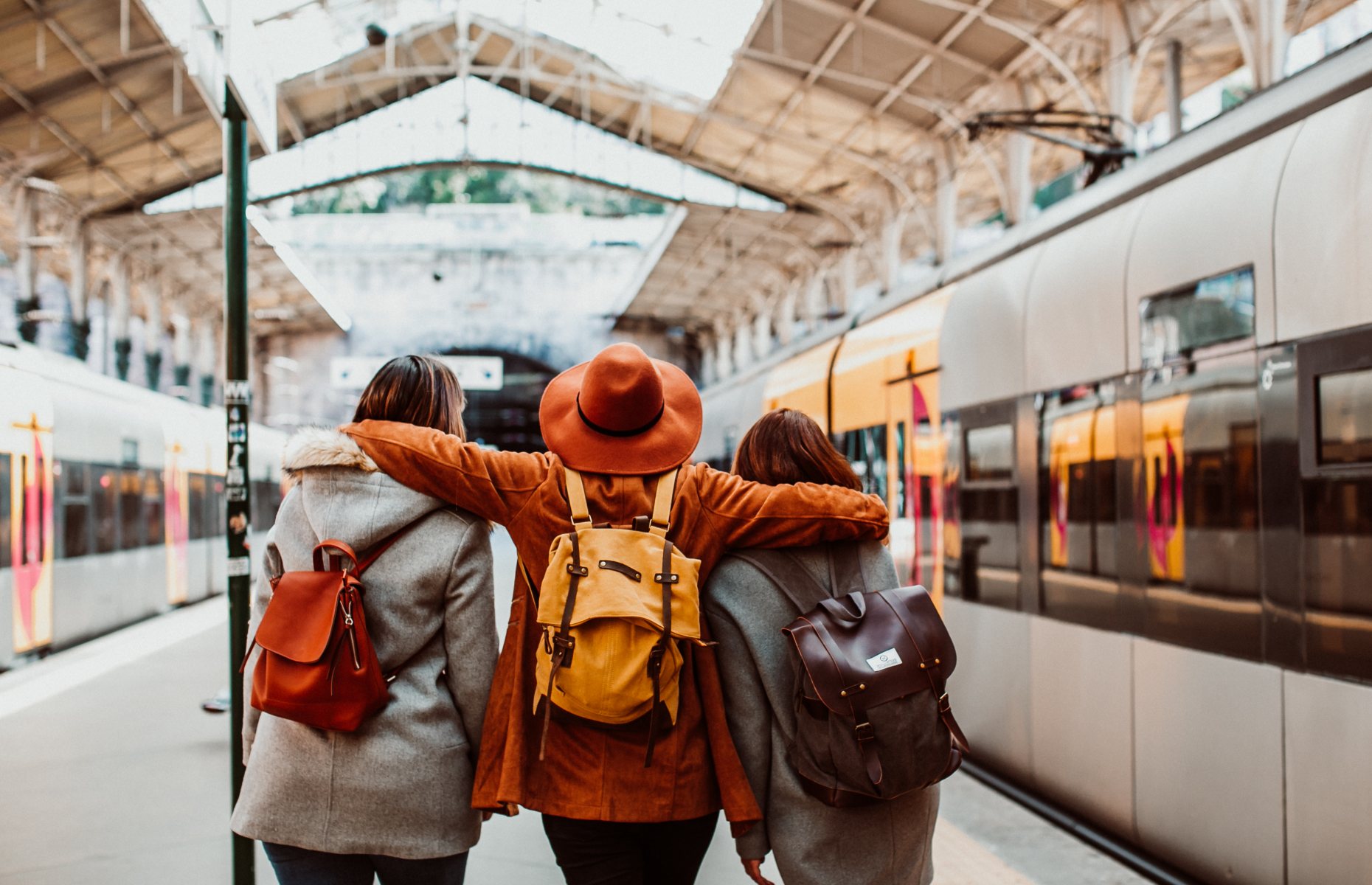Group of friends at a train station (Image: Lucia Romero/Shutterstock)
