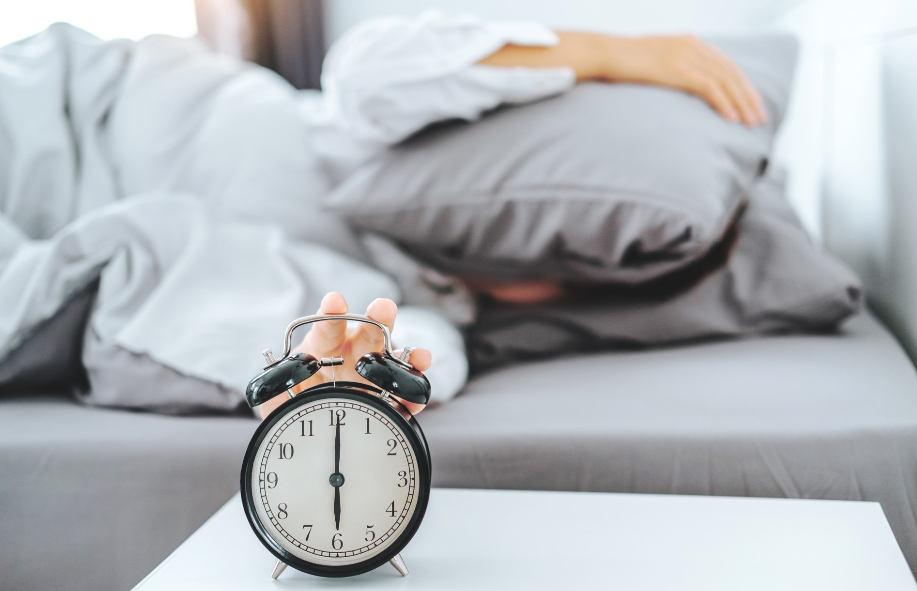 Alarm clock in hotel room (Image: Joyseulay/Shutterstock)