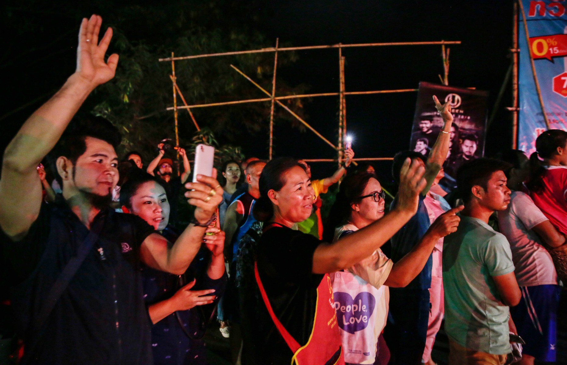 Crowds cheer as news of the boys' release spreads (Image: Lauren DeCicca/Getty Images)