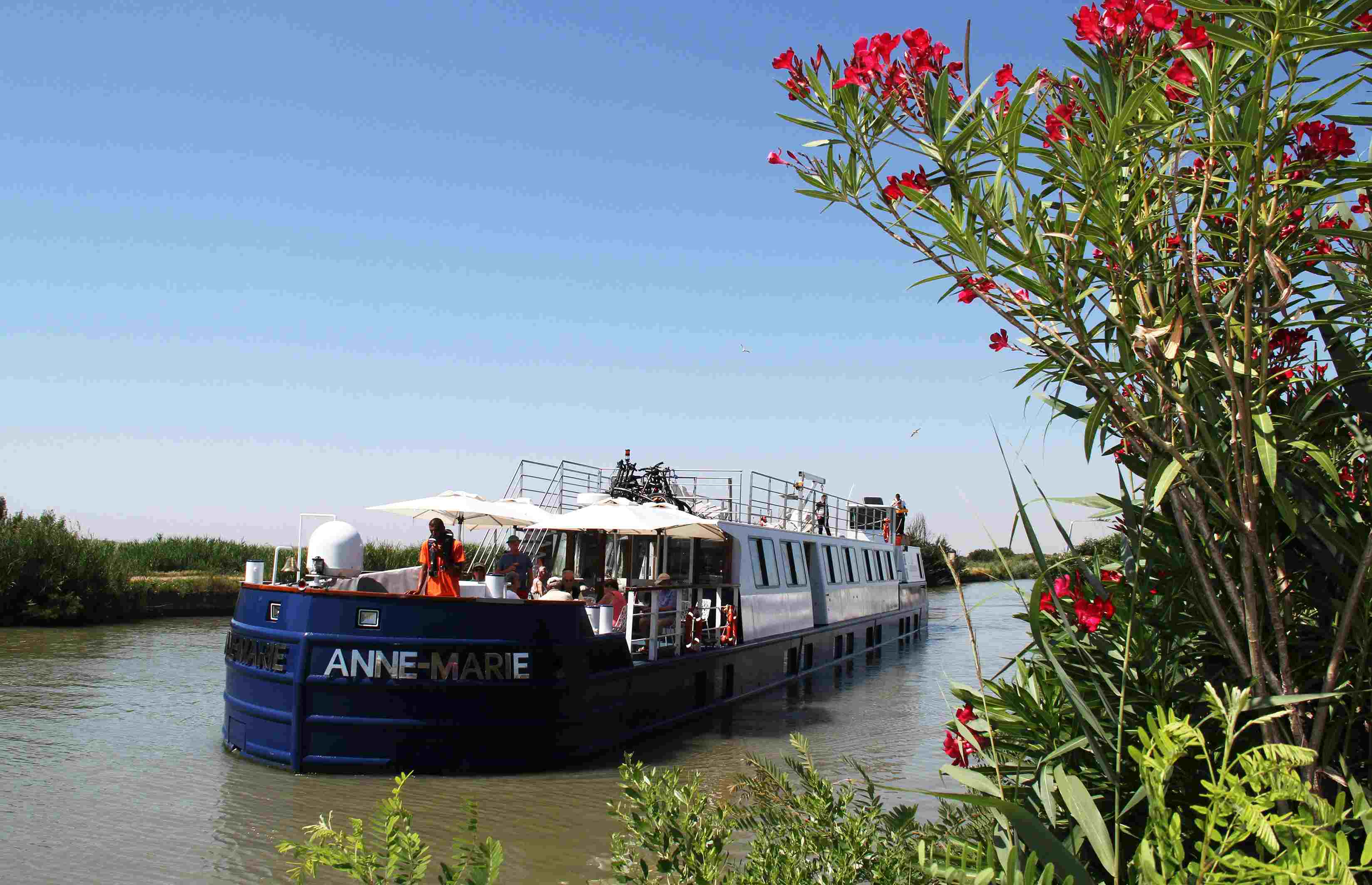 CroisiEurope Anne-Marie boat sailing down the Petit-Rhone (Image: Jean Beveraggi/Courtesy of CroisiEurope)