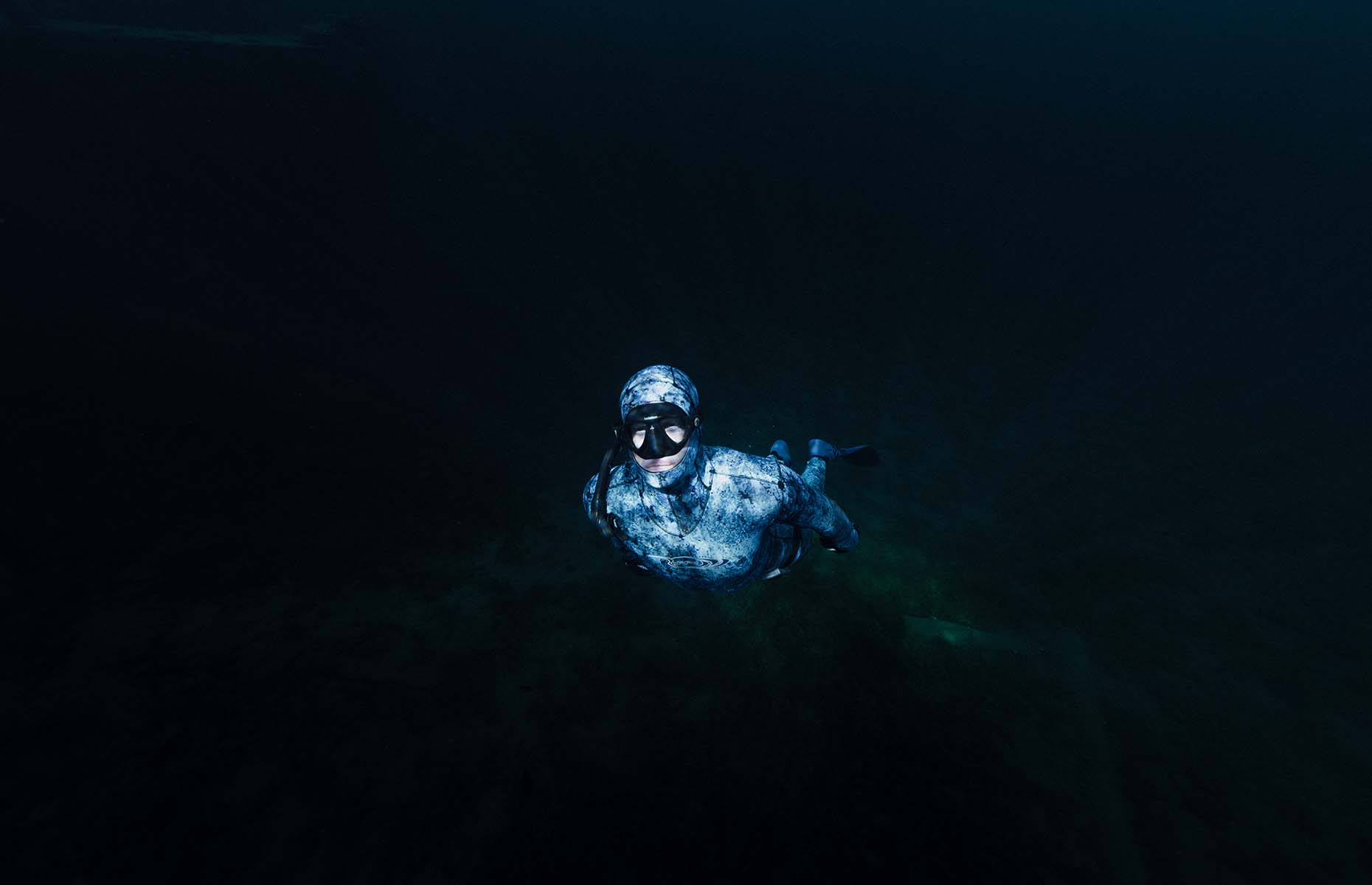 Andrew diving in Lake Huron (Image: © Geoff Coombs. Originally published alongside Change in a Single Breath by Lilly Ryzebol with Andrew Ryzebol in Sidetracked magazine.)