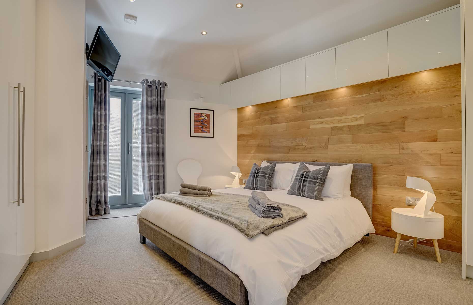 One of the bedrooms in the Old Church Barn (Image: Winterton Cottages)