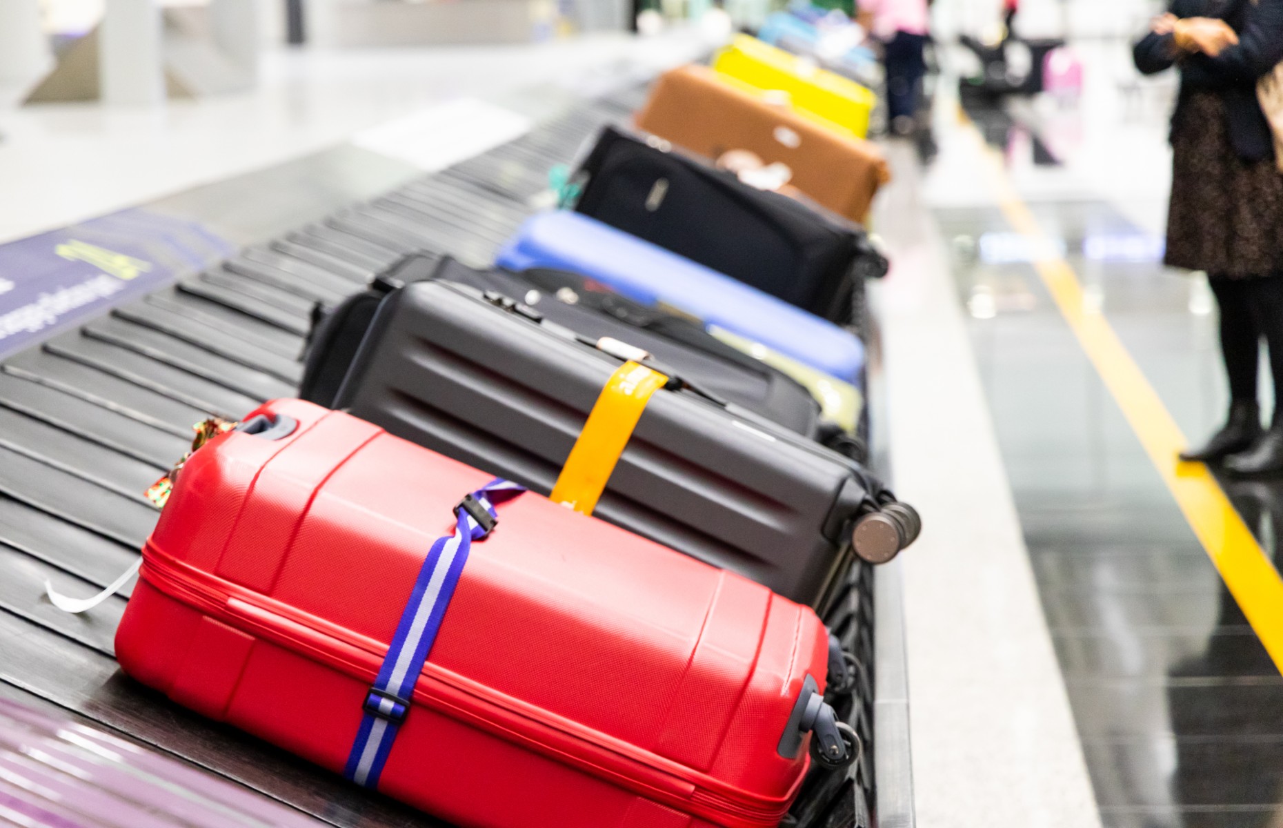 Luggage on baggage reclaim (Image: ThamKC/Shutterstock)