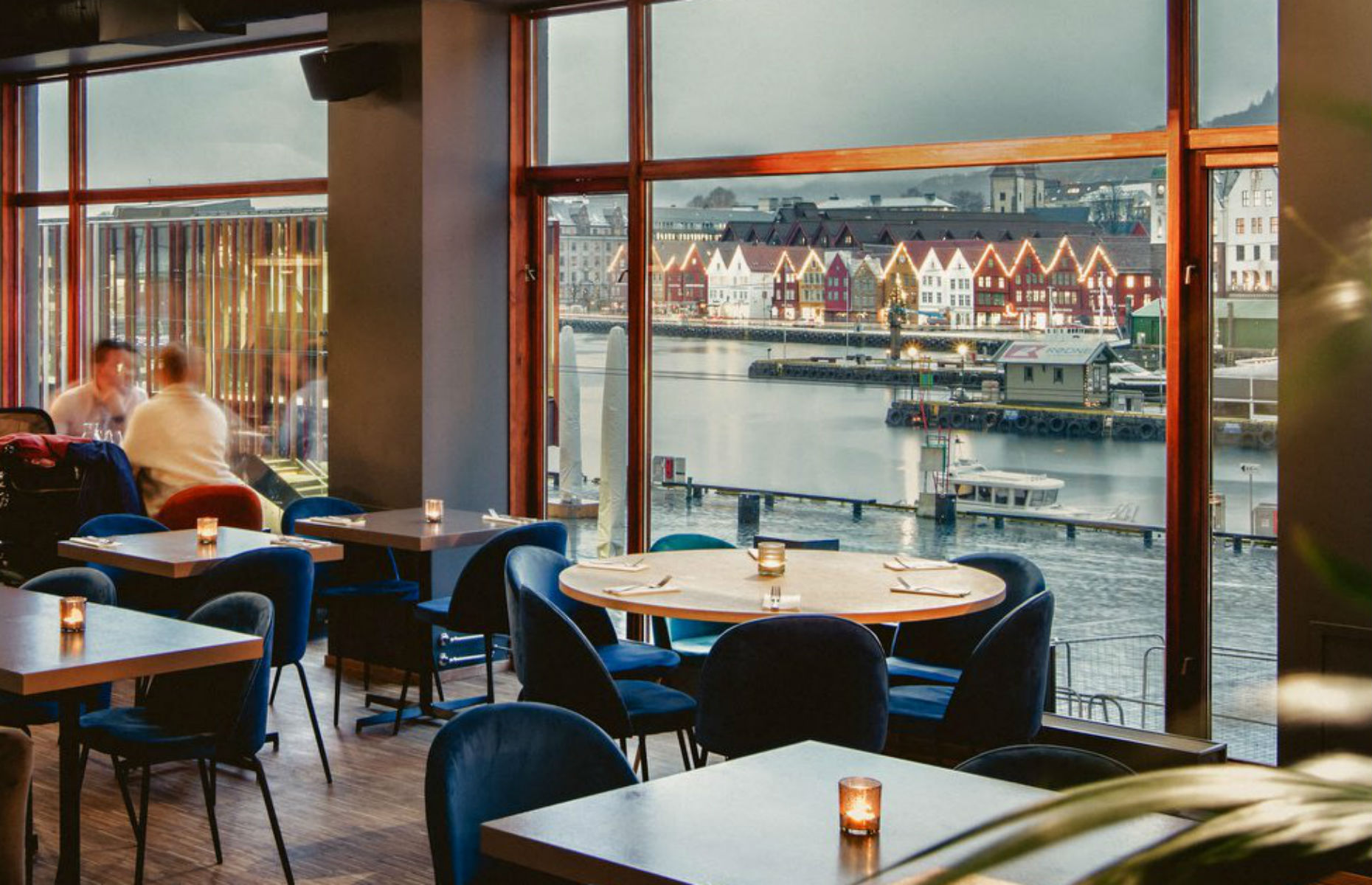 A table at Bjerck restaurant and bar with a view of the harbour (Image: Bjerck Restaurant & Bar/Facebook)