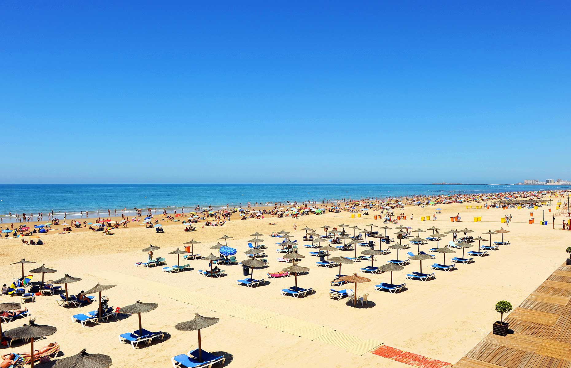 Playa la Victoria sandy beach and blue sky in Cadiz Spain