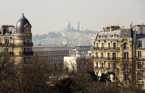 View of the Basilica Sacre-Coeur from the park des Buttes-Chaumont, Paris, France