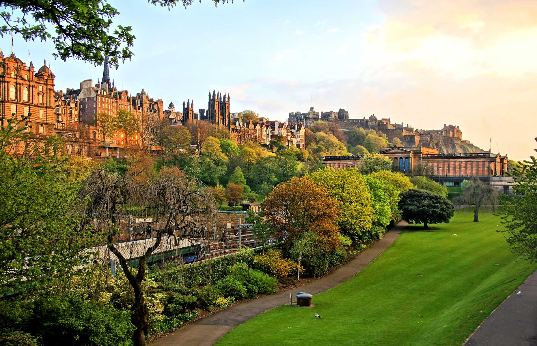 View of Edinburgh at sunset from Princes Street (Image: JeniFoto/Shutterstock)