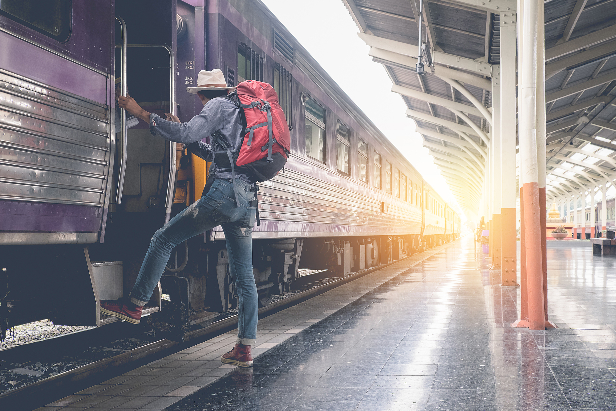 Man getting on train