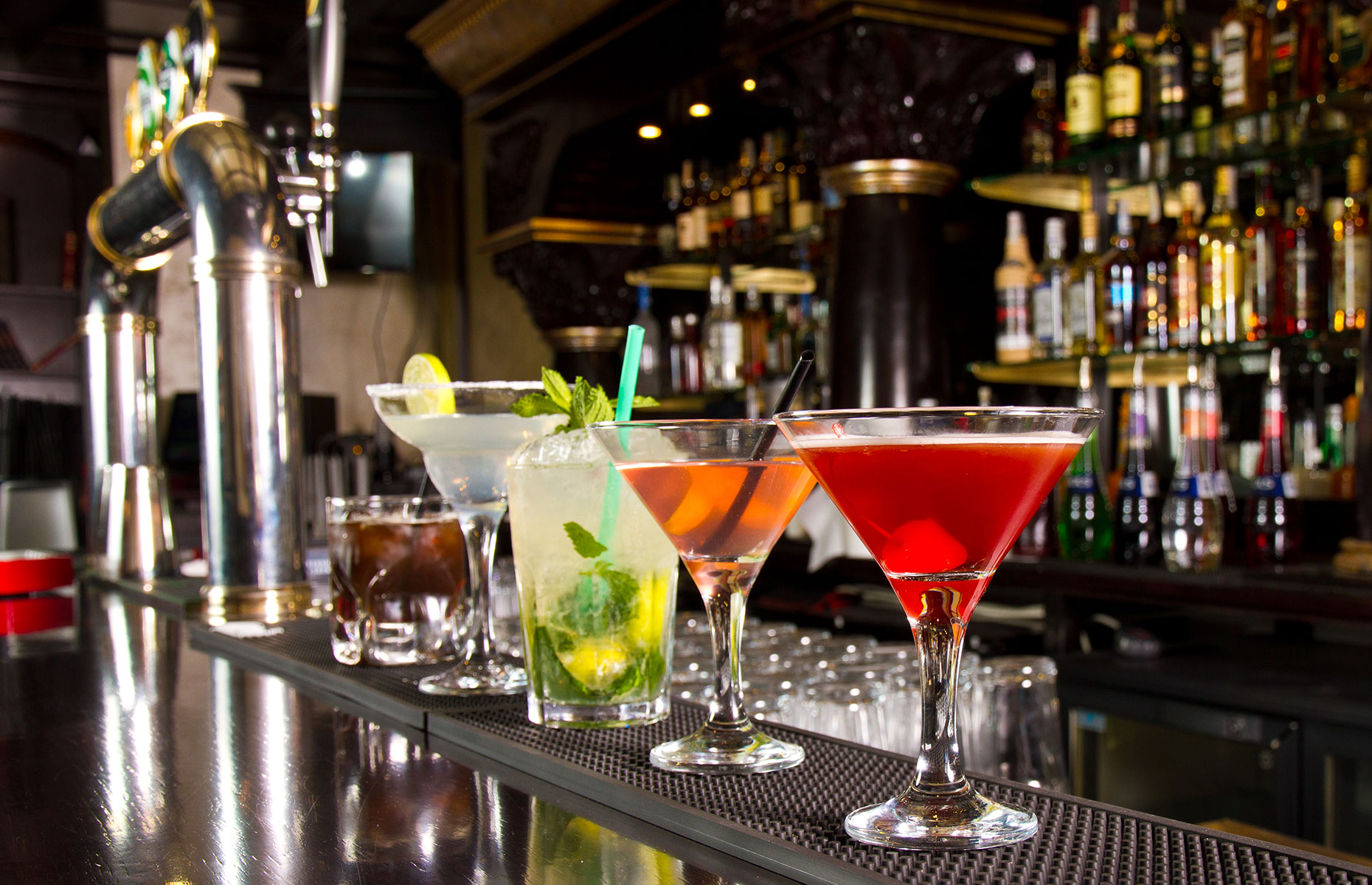 UK bar with brightly-coloured cocktails