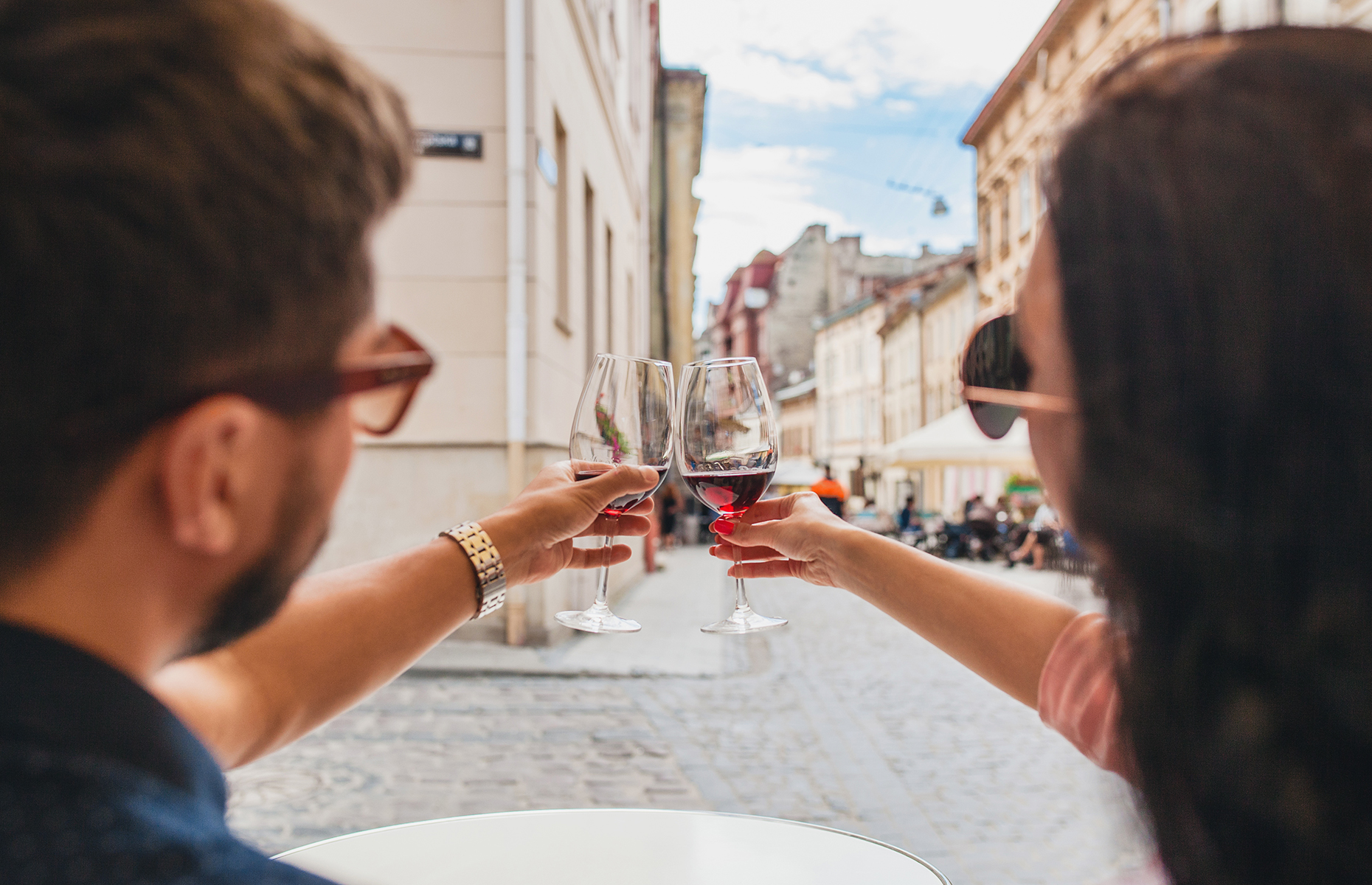 Couple on vacation with wine