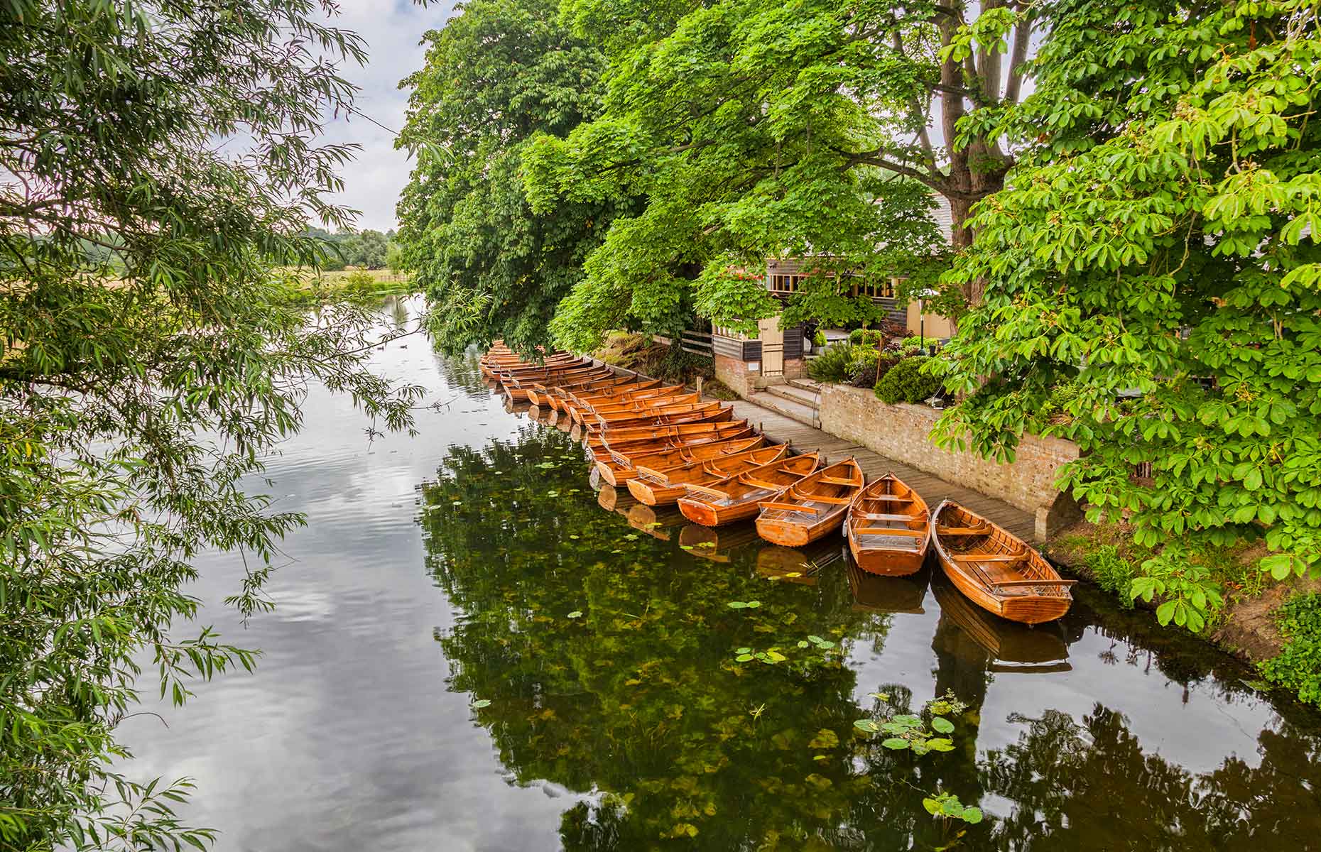 Boats on the River Stour in summer at Dedham Essex (Image: travellight/Shutterstock)