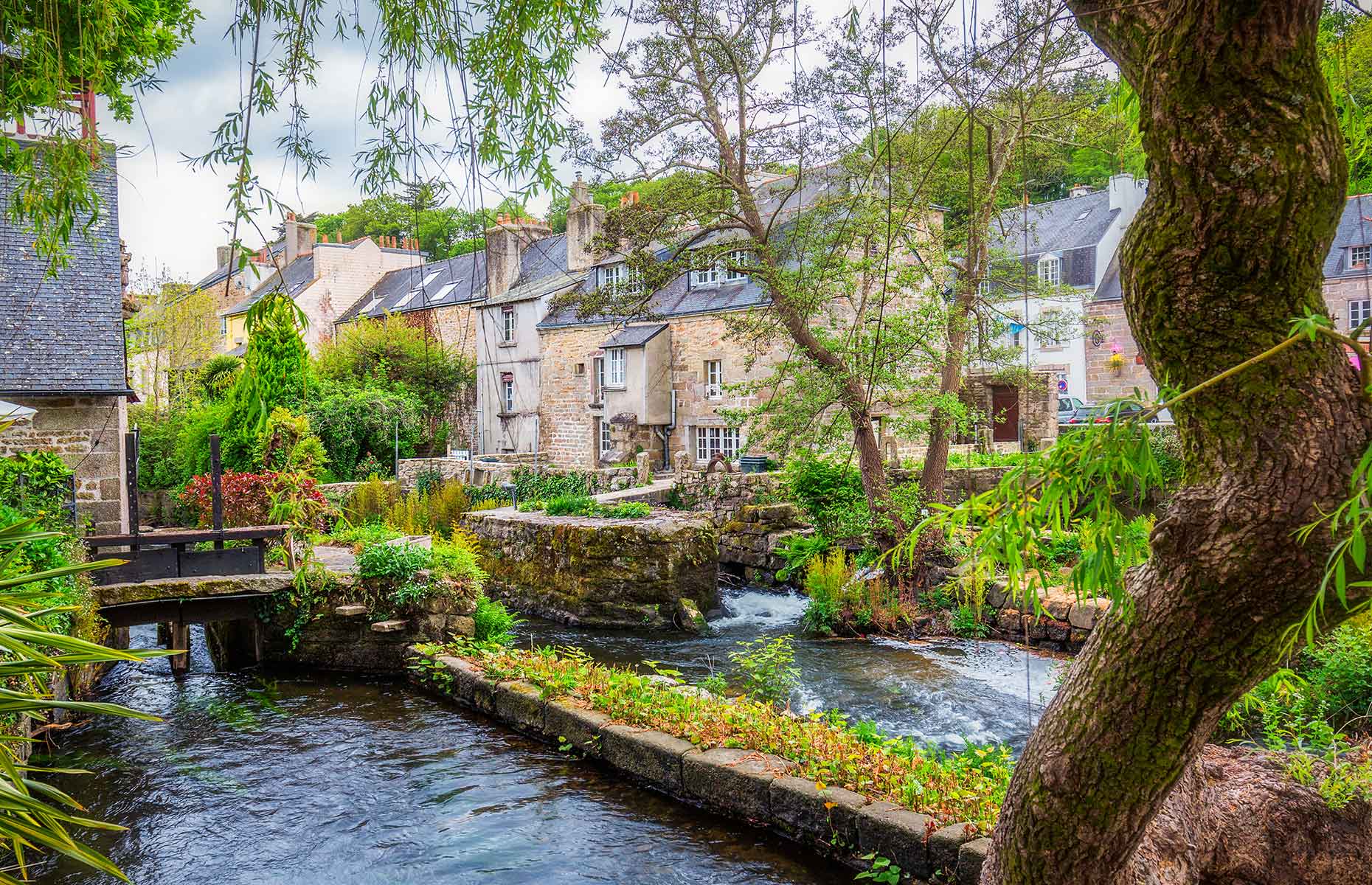 Pont Aven's river and cottages, Brittany, France (Image: DaLiu/Shutterstock)