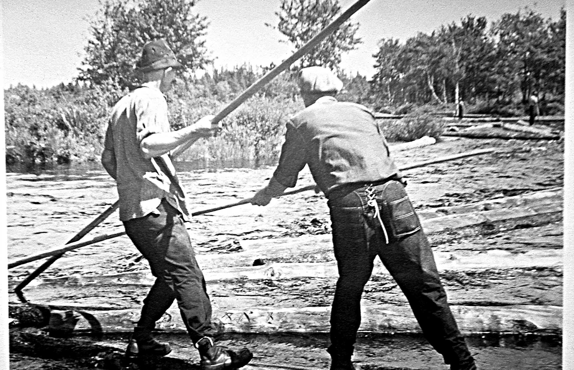 Stanley and a fellow ‘river hog’ working on the Clyde River log drive, 1932. (Image: Darren Hudson/Wild Axe Productions)