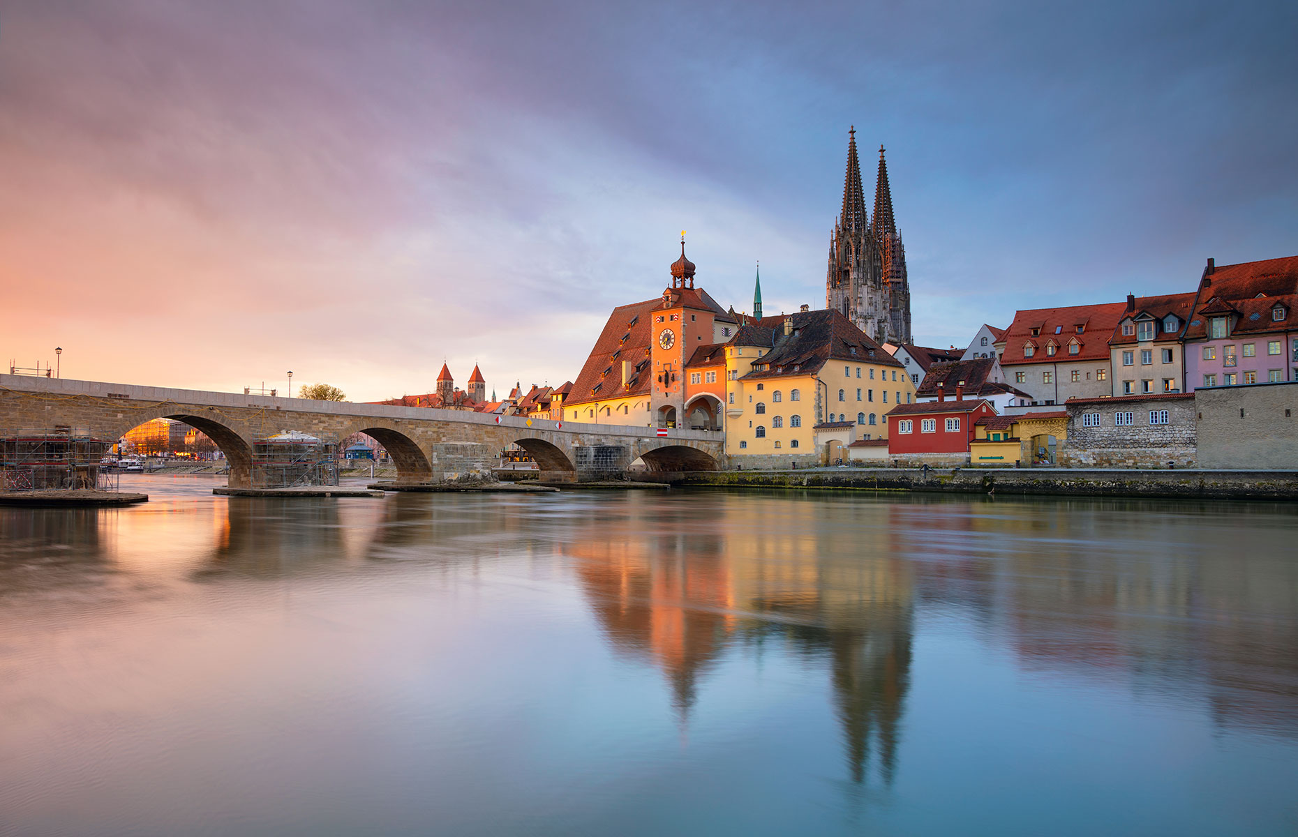 Regensburg, Germany, and its stone bridge is a regular stop on a river cruise along the Danube (Image: Rudy Balasko/Shutterstock)