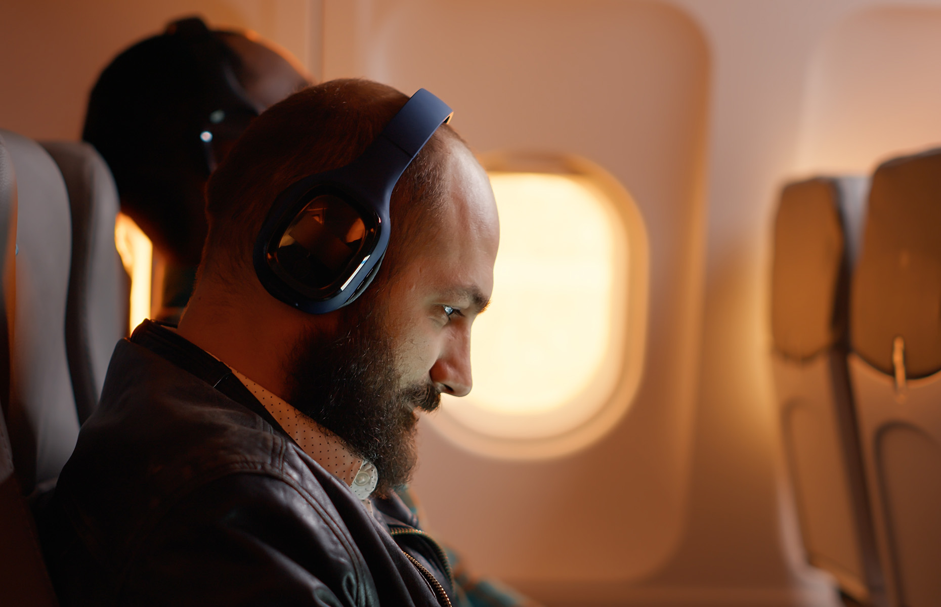 Man with headphones on (Image: DC Studio/Shutterstock)
