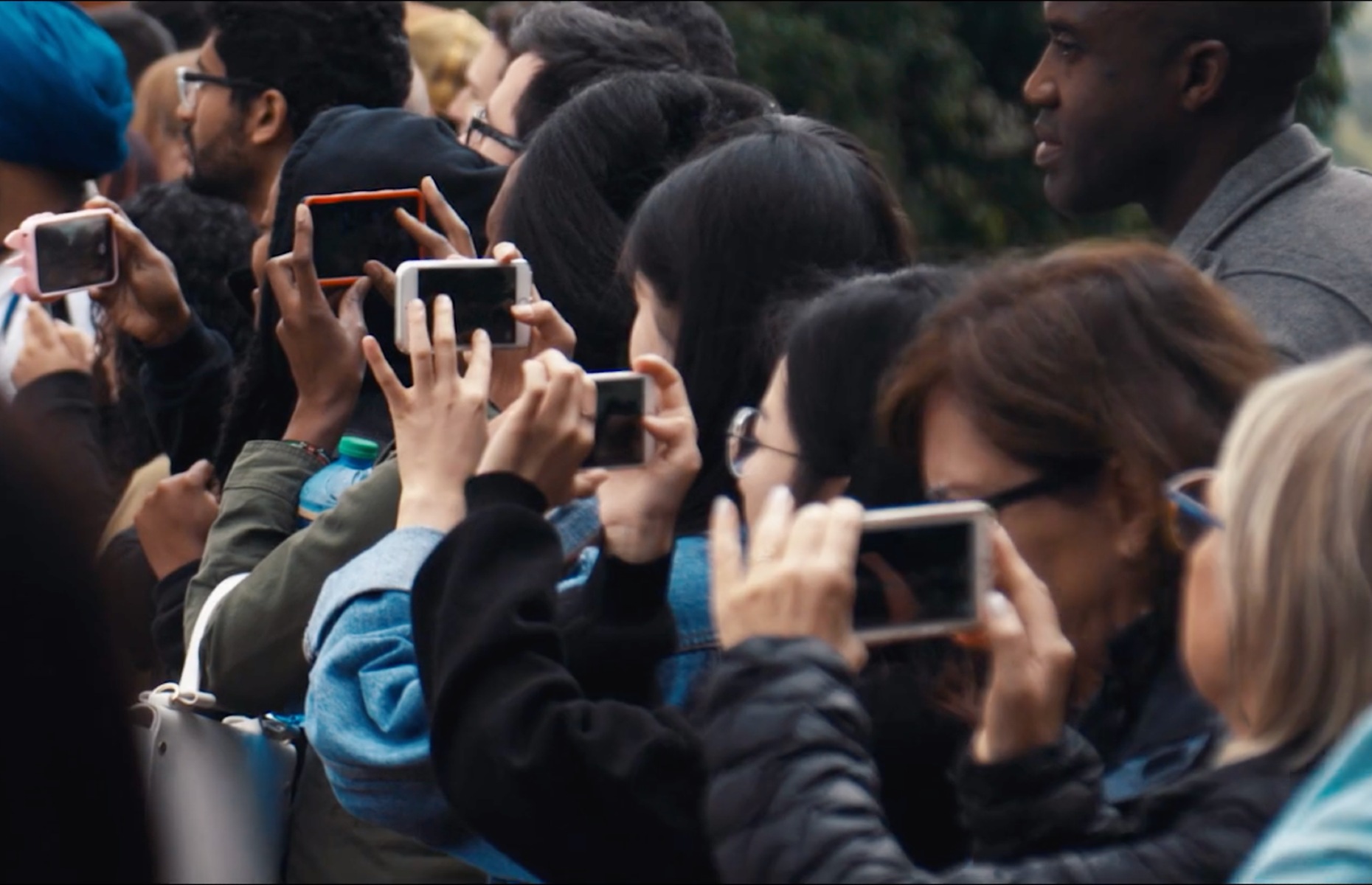 A crowd of tourists taking photos (Image: G Adventures/The Last Tourist)