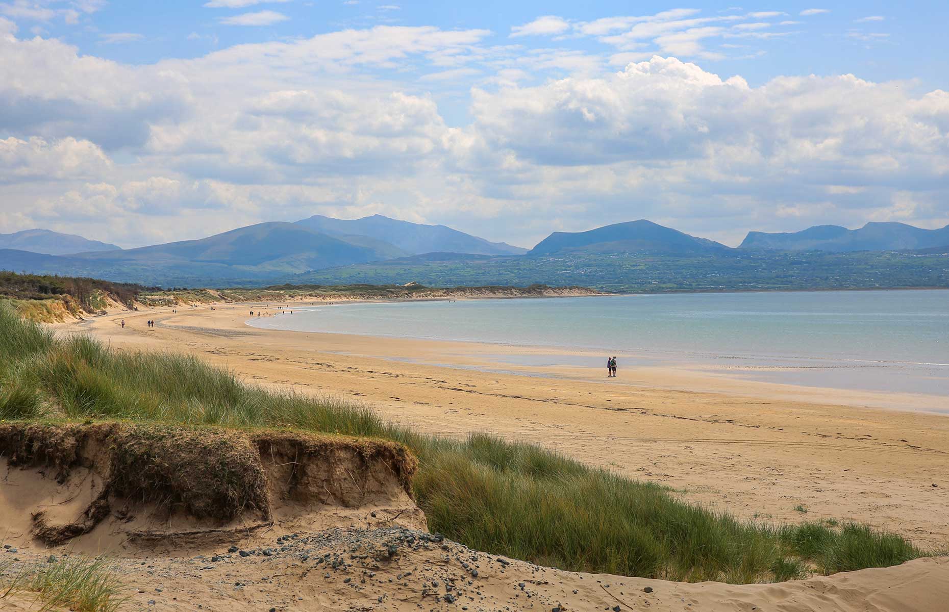 Newborough Beach Bay in Anglesey Wales (Image: Martina Hardiman/Shutterstock)