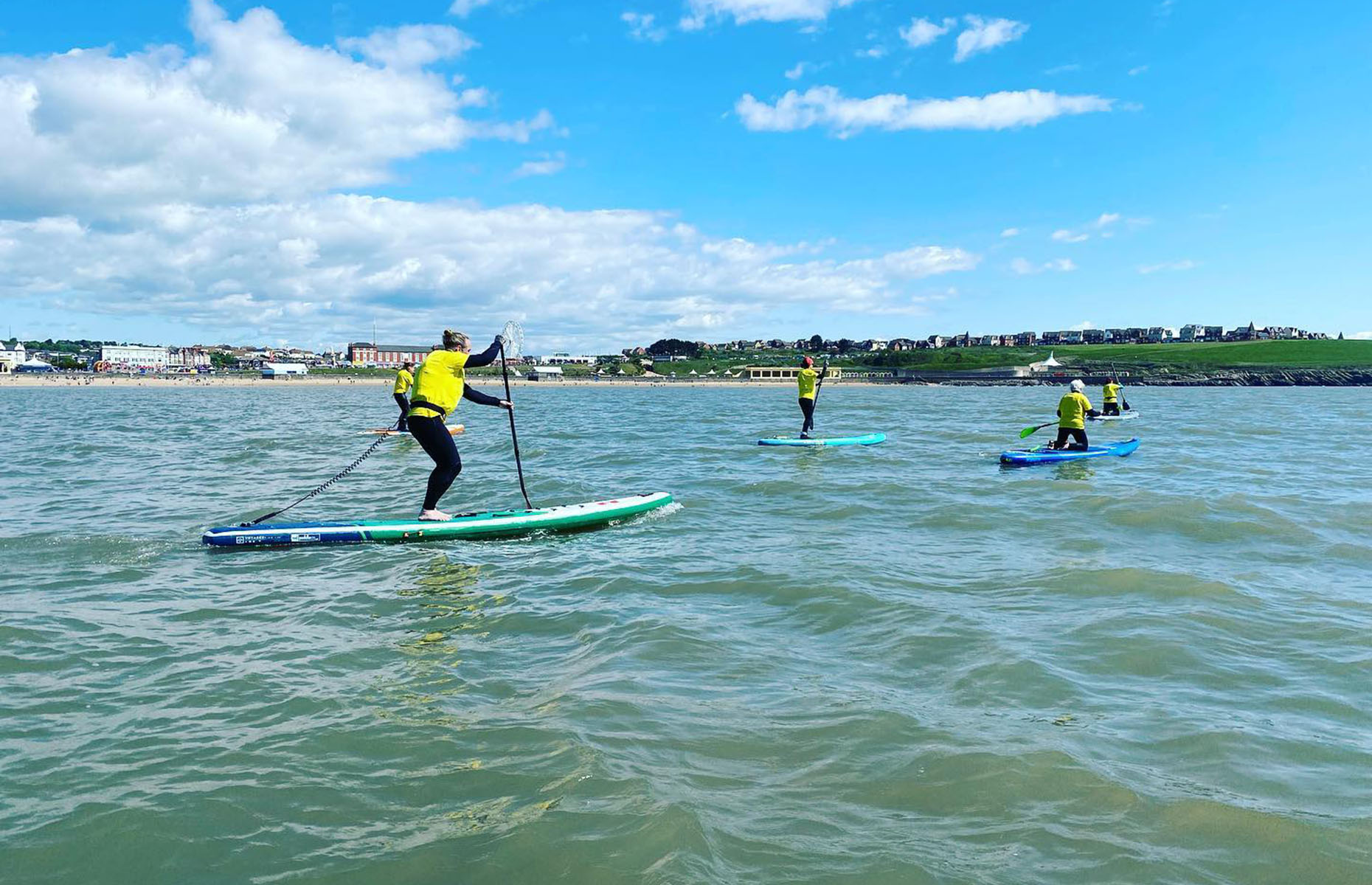 Stand-up paddleboarding on Barry Island (Visit the Vale)