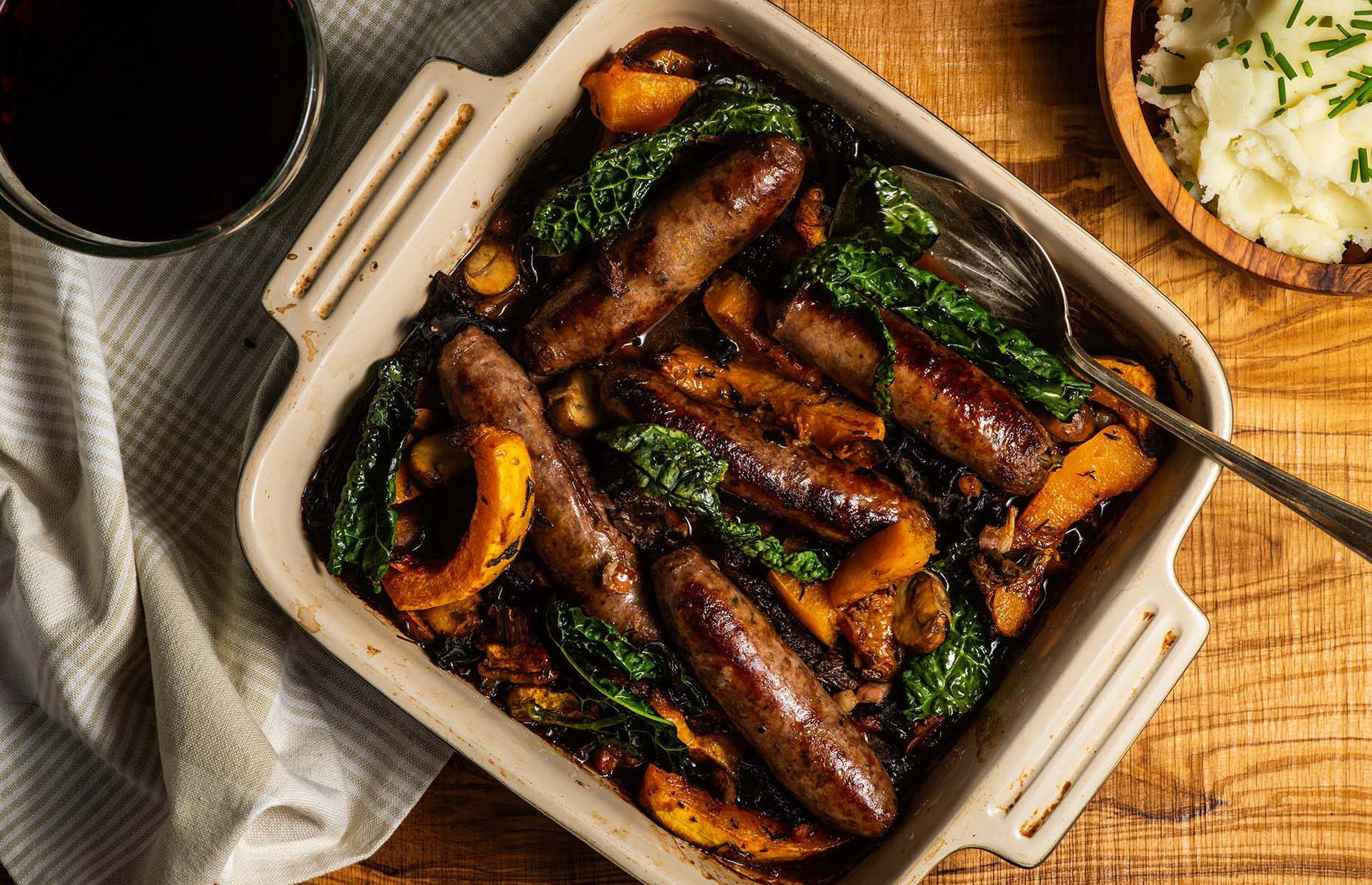 Venison sausage and wild mushroom traybake (Image: The Dorset Meat Company/loveFOOD)