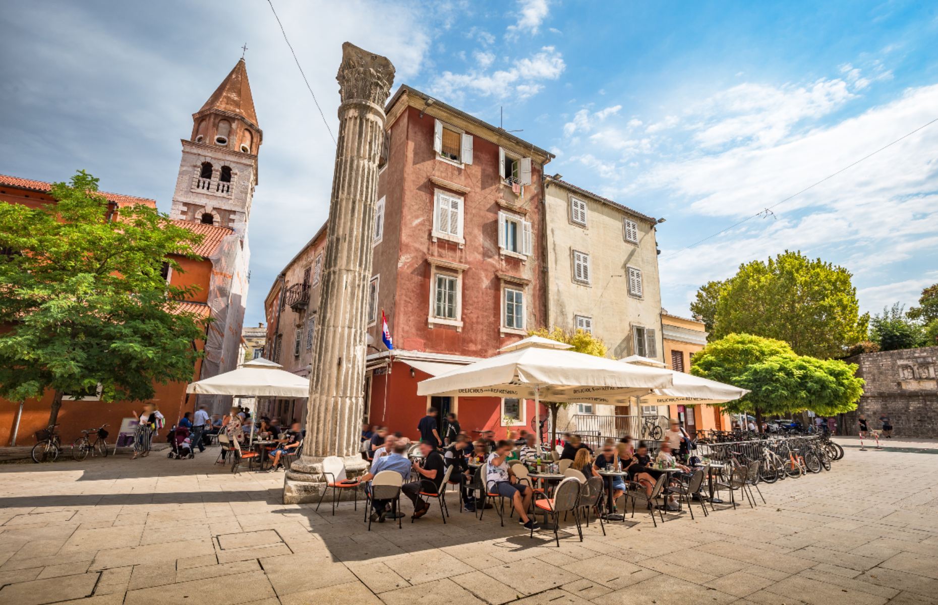 Drinking coffee in a Croatian cafe (Image: Nyokki/Shutterstock)