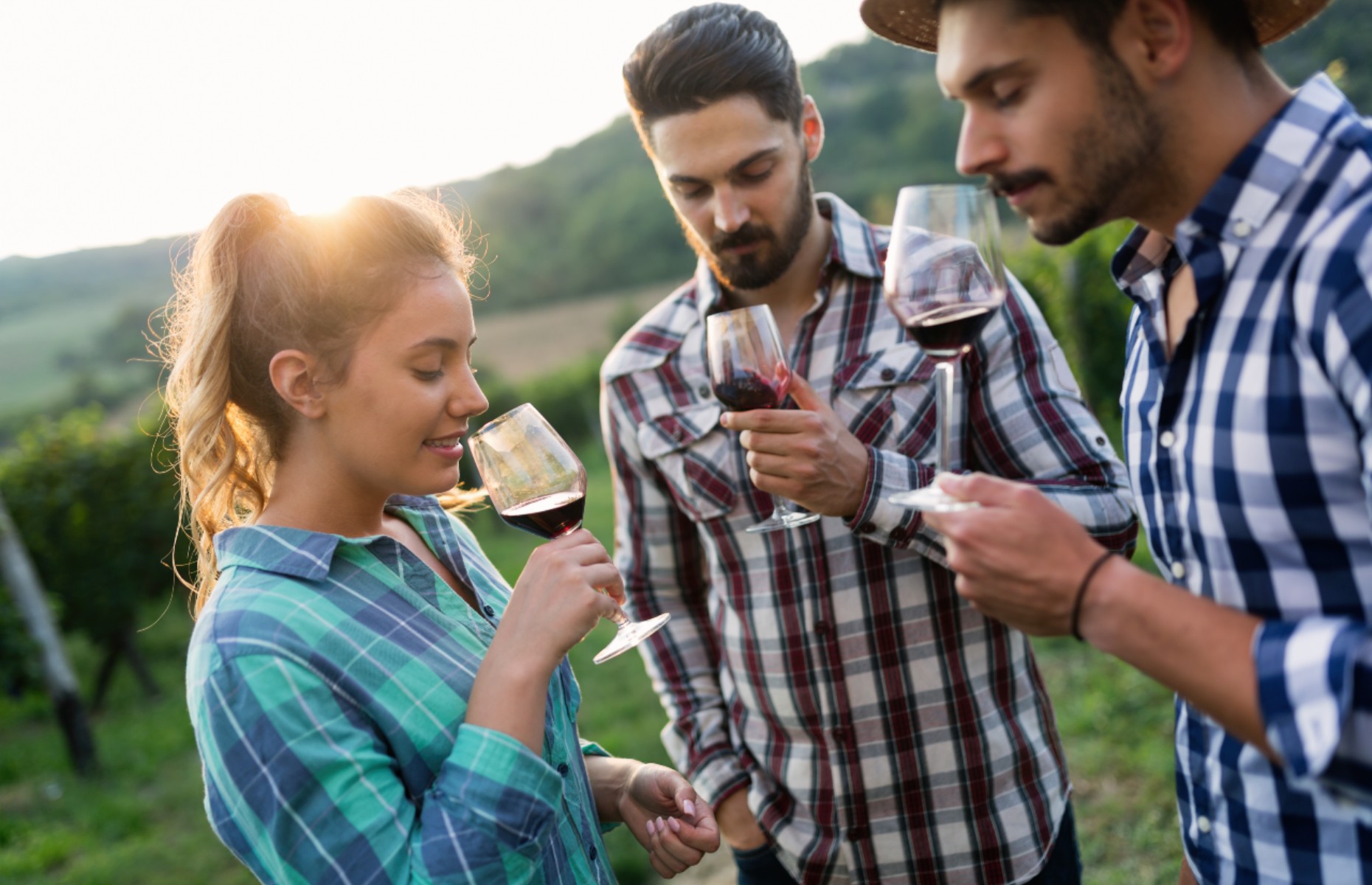 Friends smelling wine for a wine tasting (Image: NDAB Creativity/Shutterstock)