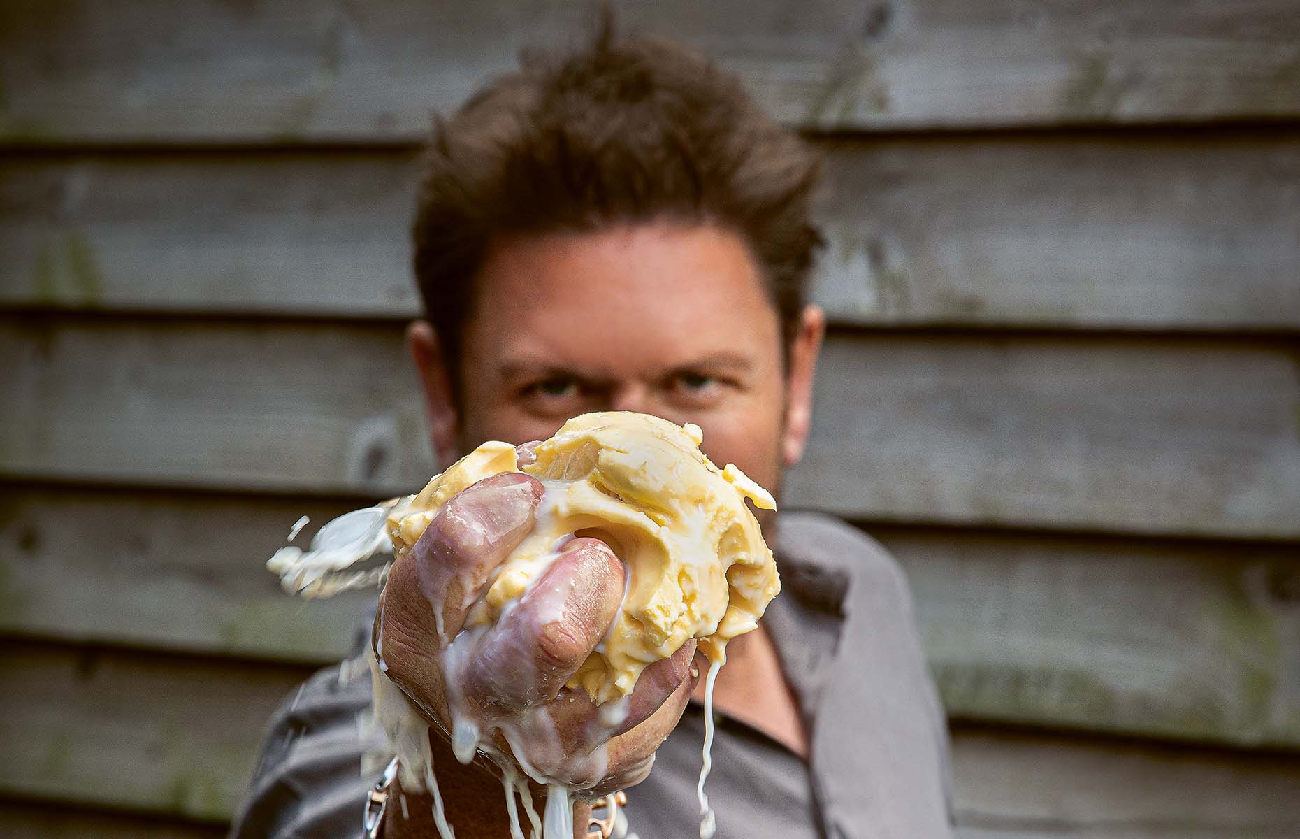 James Martin squeezing a block of butter (Image: John Carey)