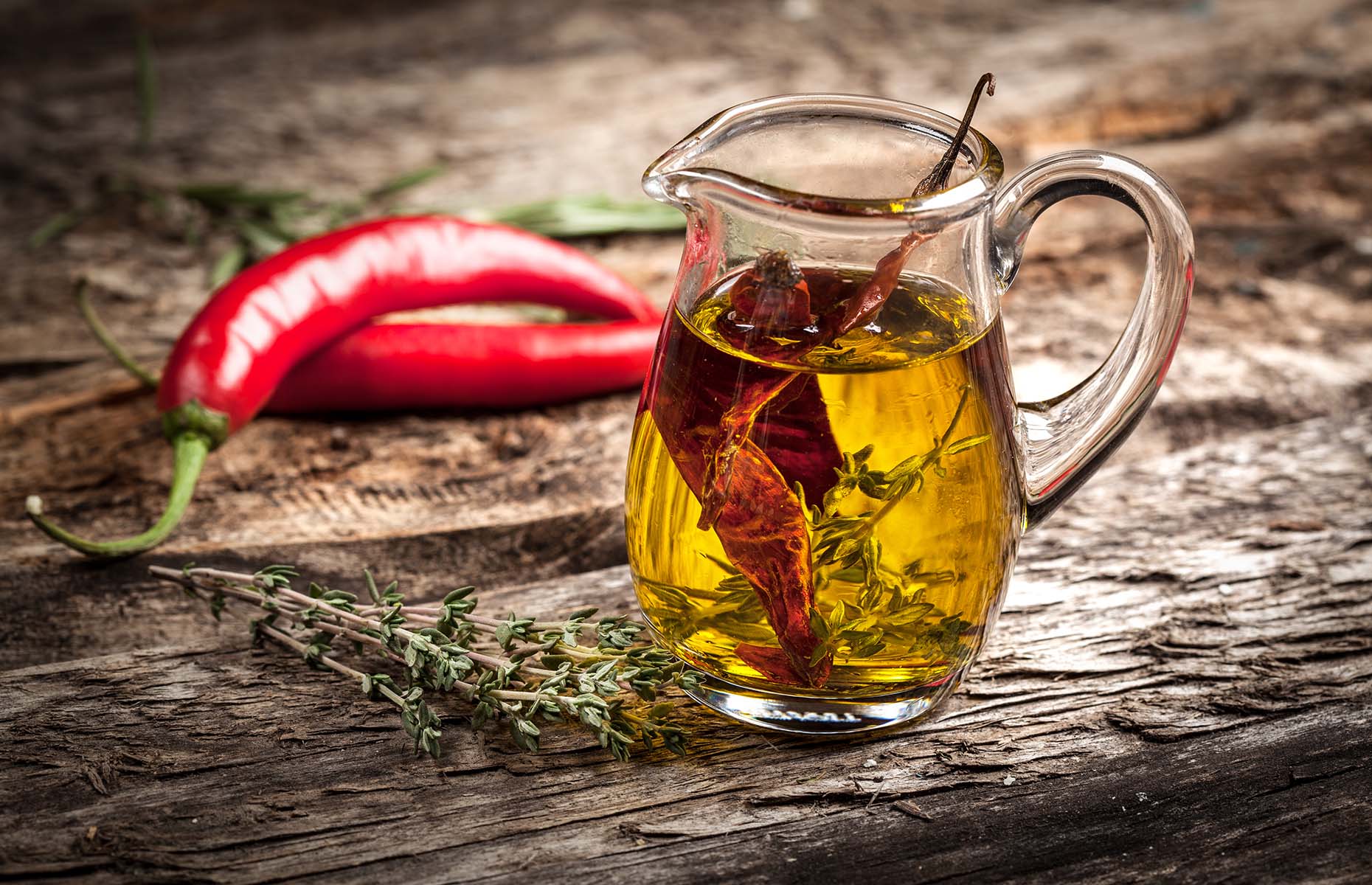 Dried chillies infusing olive oil (Image: Tim UR/Shutterstock)