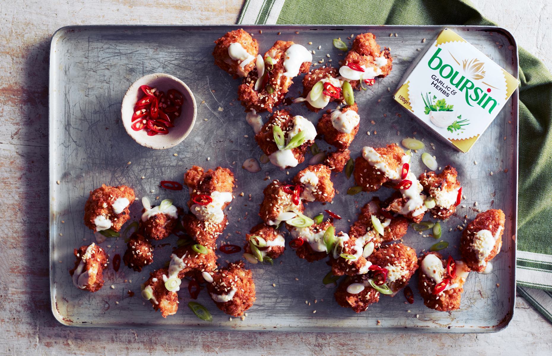 Kenny's sweet chilli cauliflower "wings" with a creamy Boursin drizzle and toasted sesame (Image: Boursin)