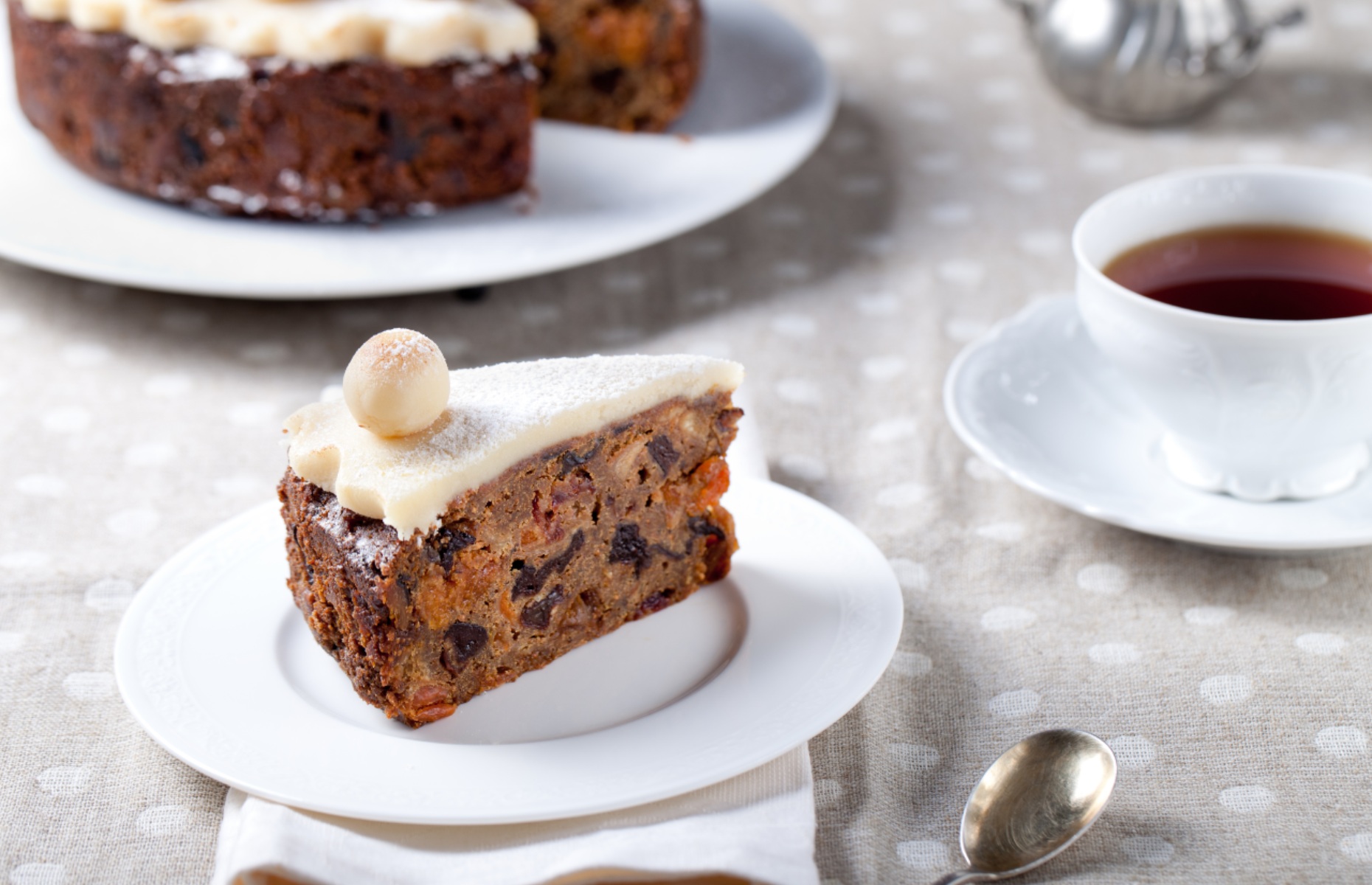 A slice of Simnel cake with marzipan decorations (Image: Anna_Pustynnikova/Shutterstock)