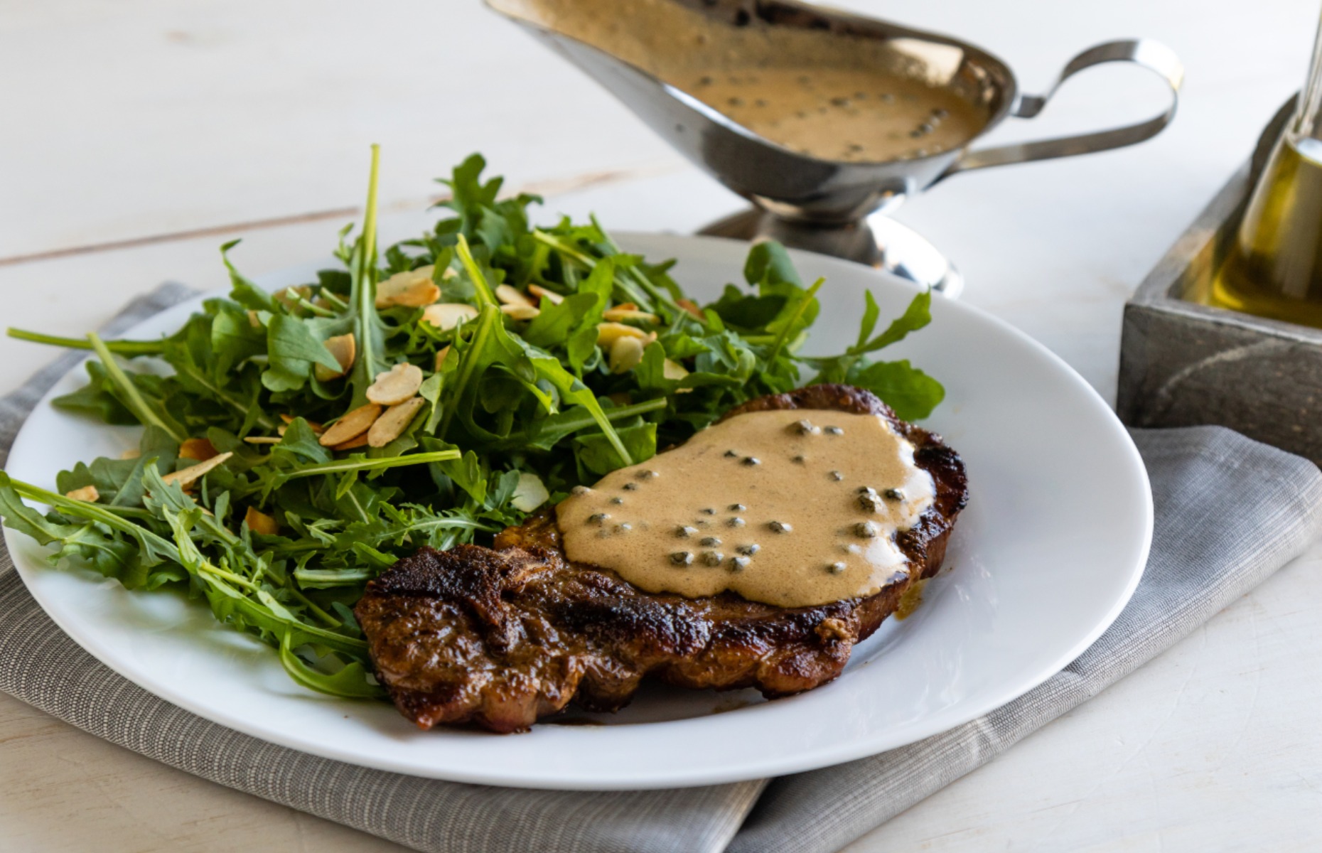 Steak with green peppercorn sauce (Image: Felix Furo/Shutterstock)