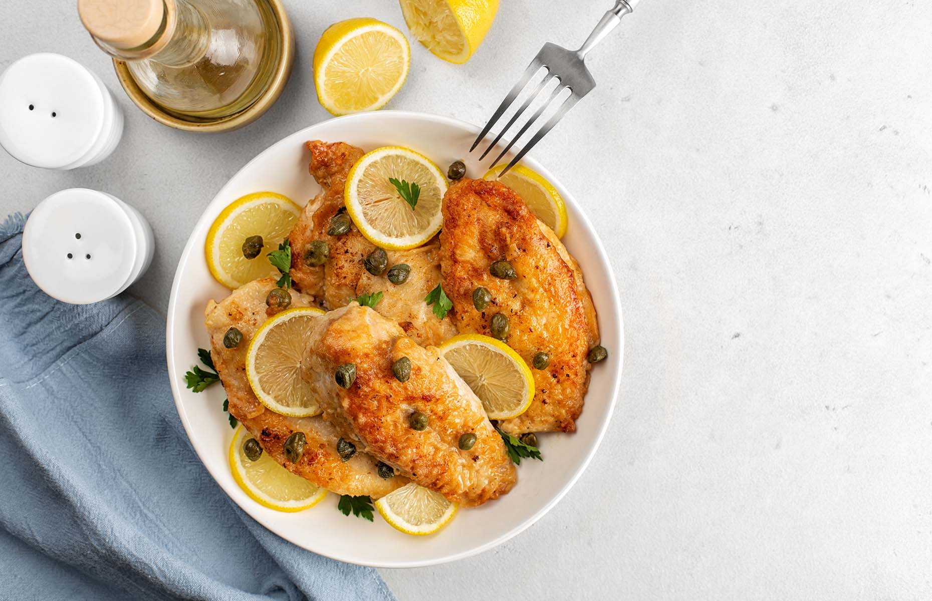 Chicken piccata with capers (Image: OlgaBombologna/Shutterstock)