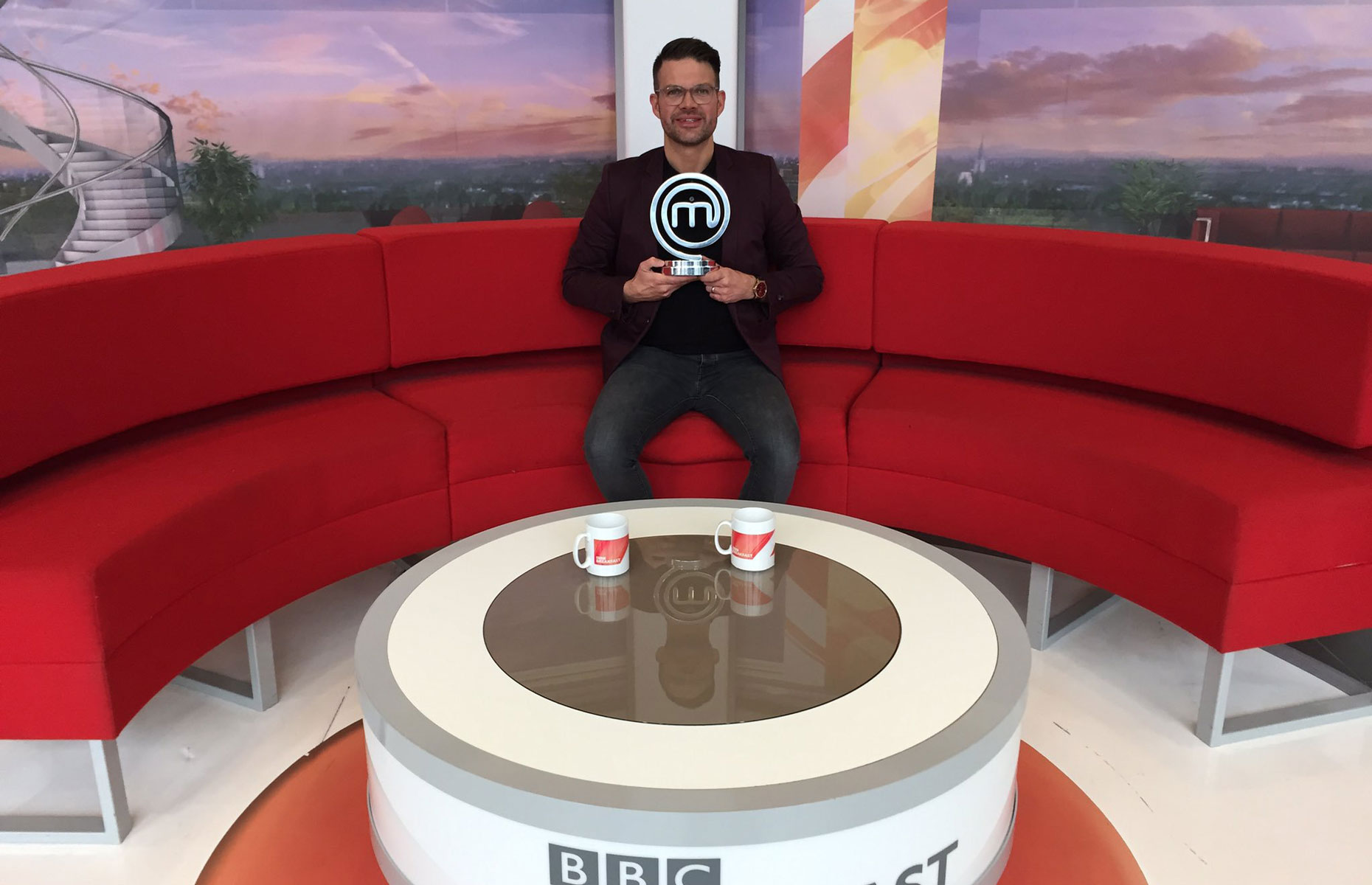 Kenny Tutt previous MasterChef winner from 2018 pictured on BBC Breakfast with his winner's trophy (Image: Kenny Tutt/Twitter)