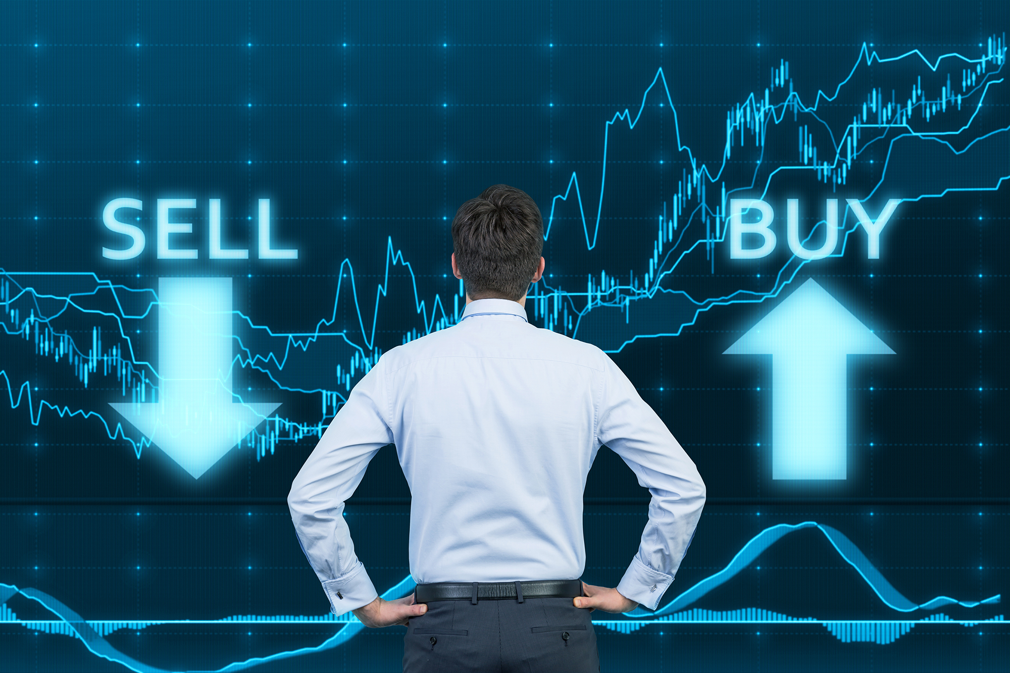 Man deciding whether to buy or sell shares. (Image: Shutterstock)