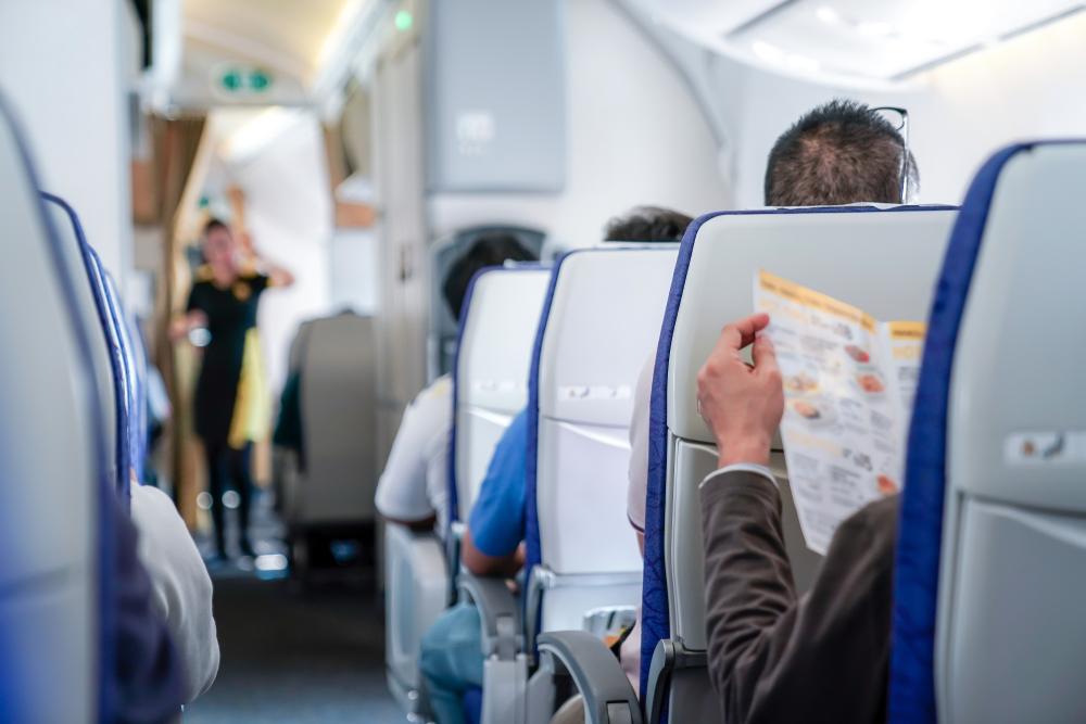 Paying to change seats on a flight is a con (Image: Shutterstock)