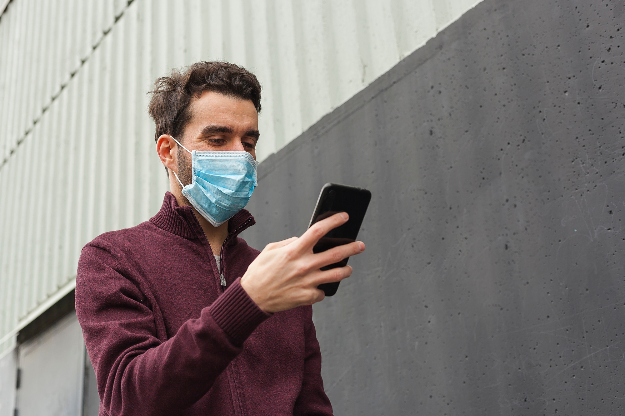 Man wearing a surgical mask. (Image: Shutterstock)