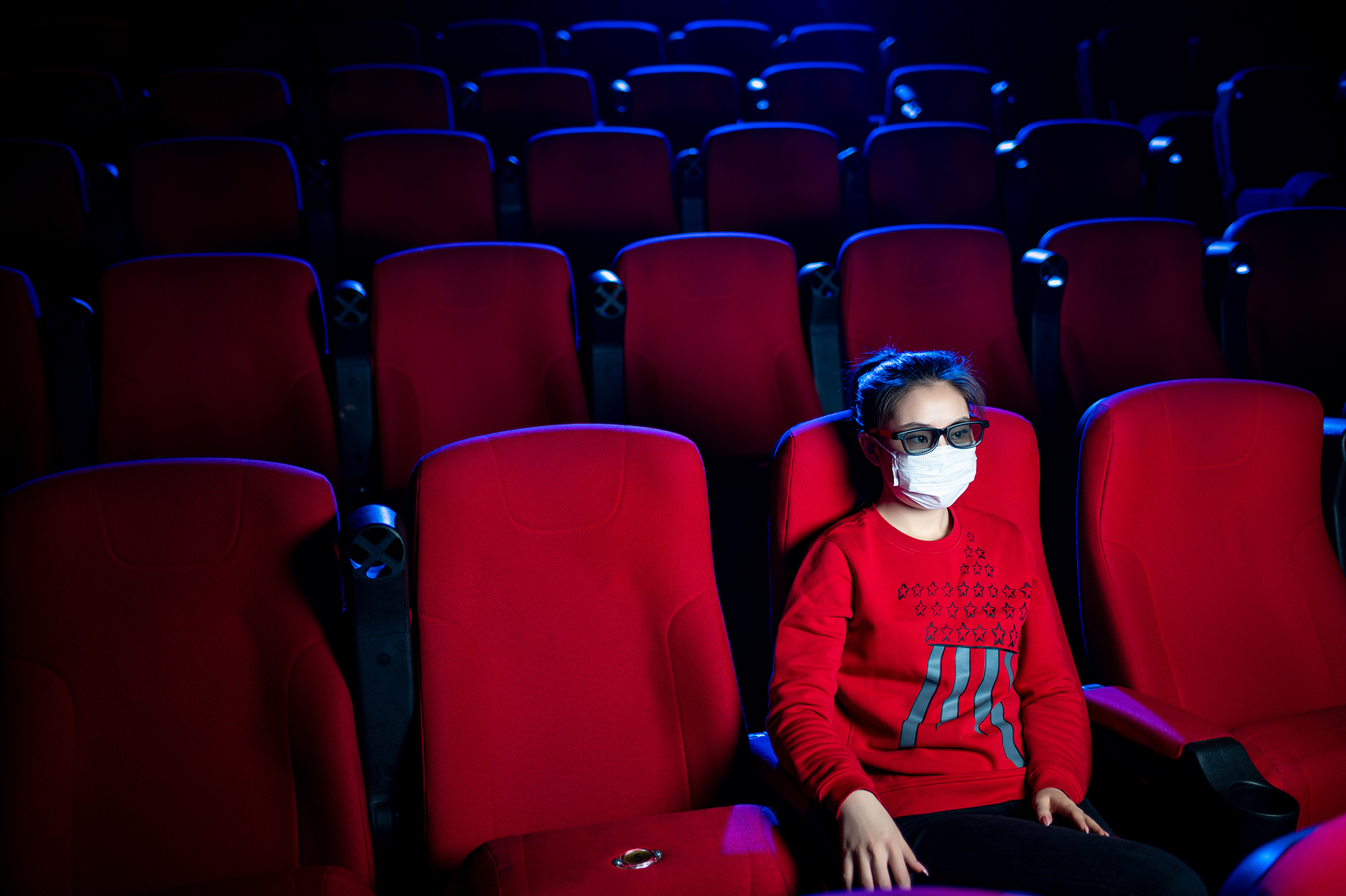 Woman at a cinema. (Image: Shutterstock)