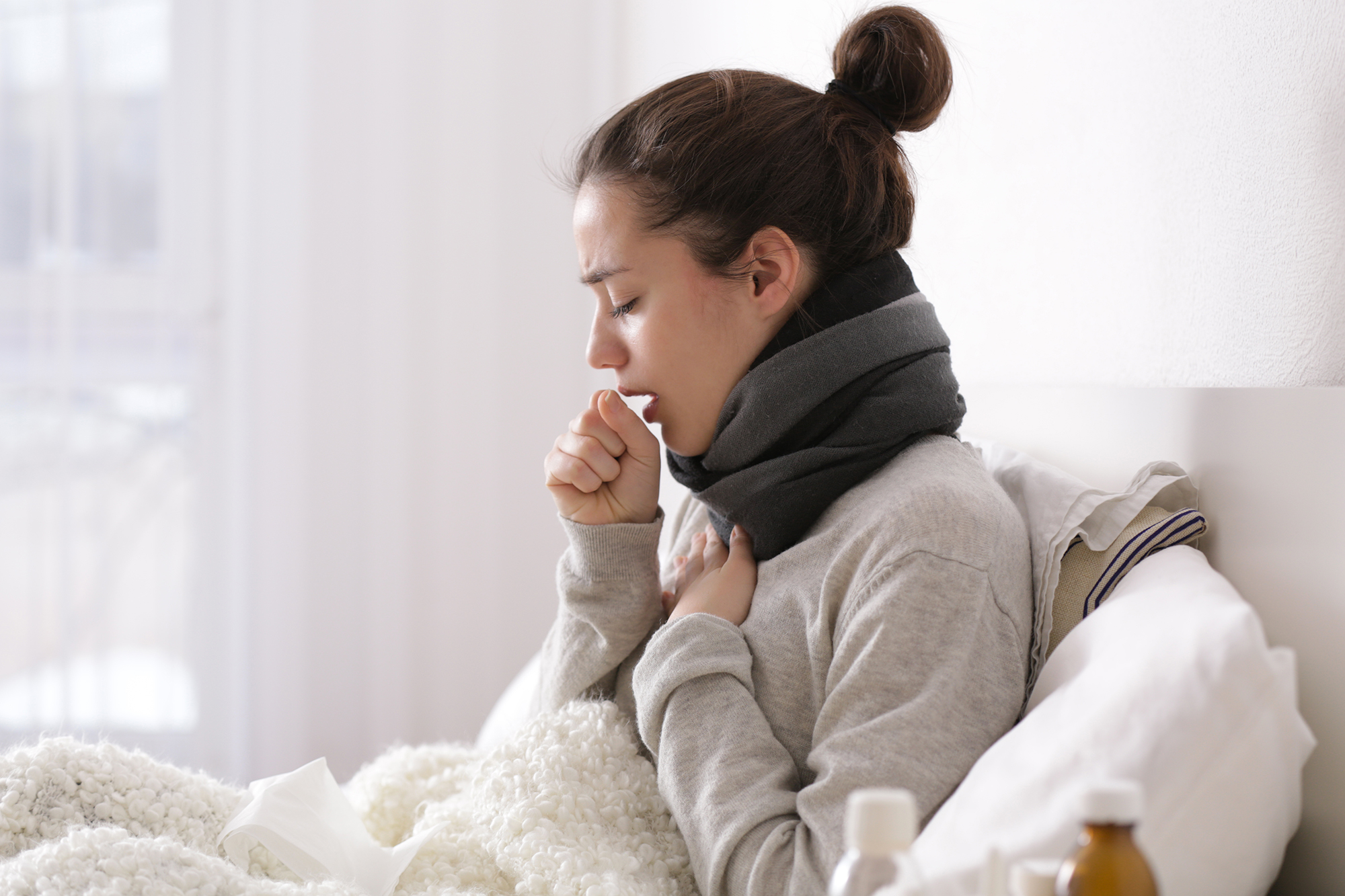 Ill woman resting at home. (Image: Shutterstock)