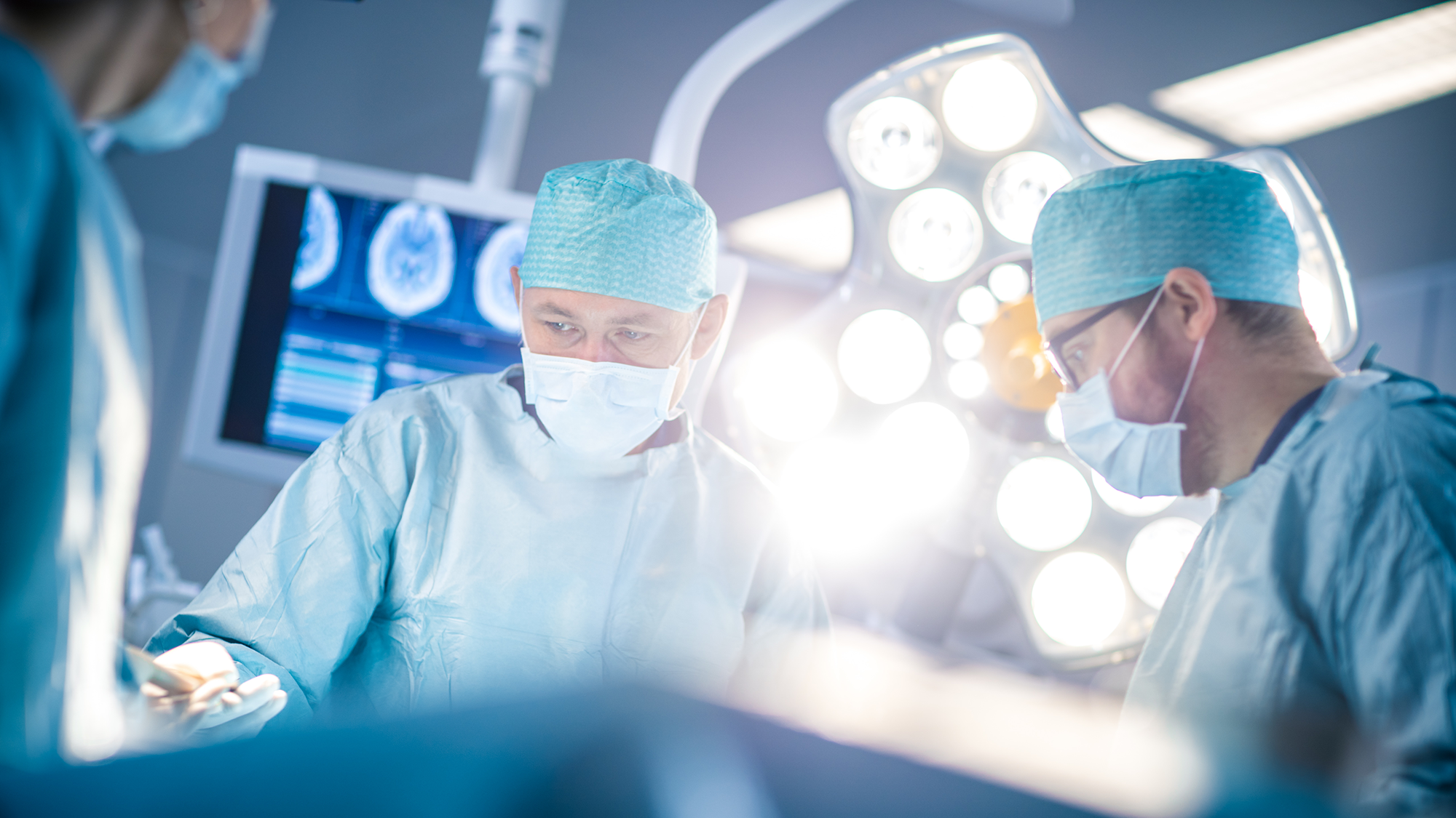 Surgeons in a surgery room. (Image: Shutterstock)