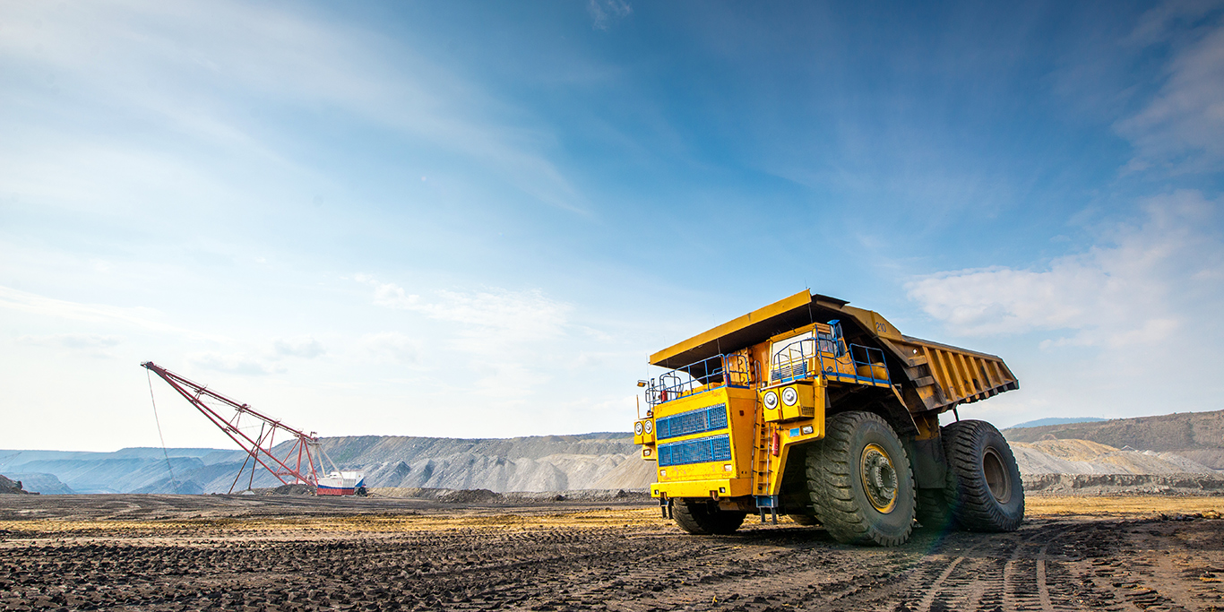 A yellow mining truck. (Image: Shutterstock)