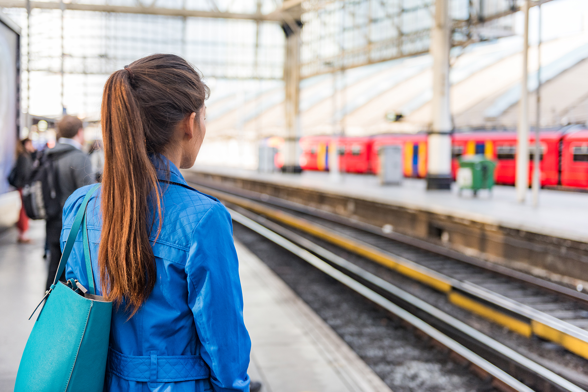 Woman waiting for train. (Image: Shutterstock)