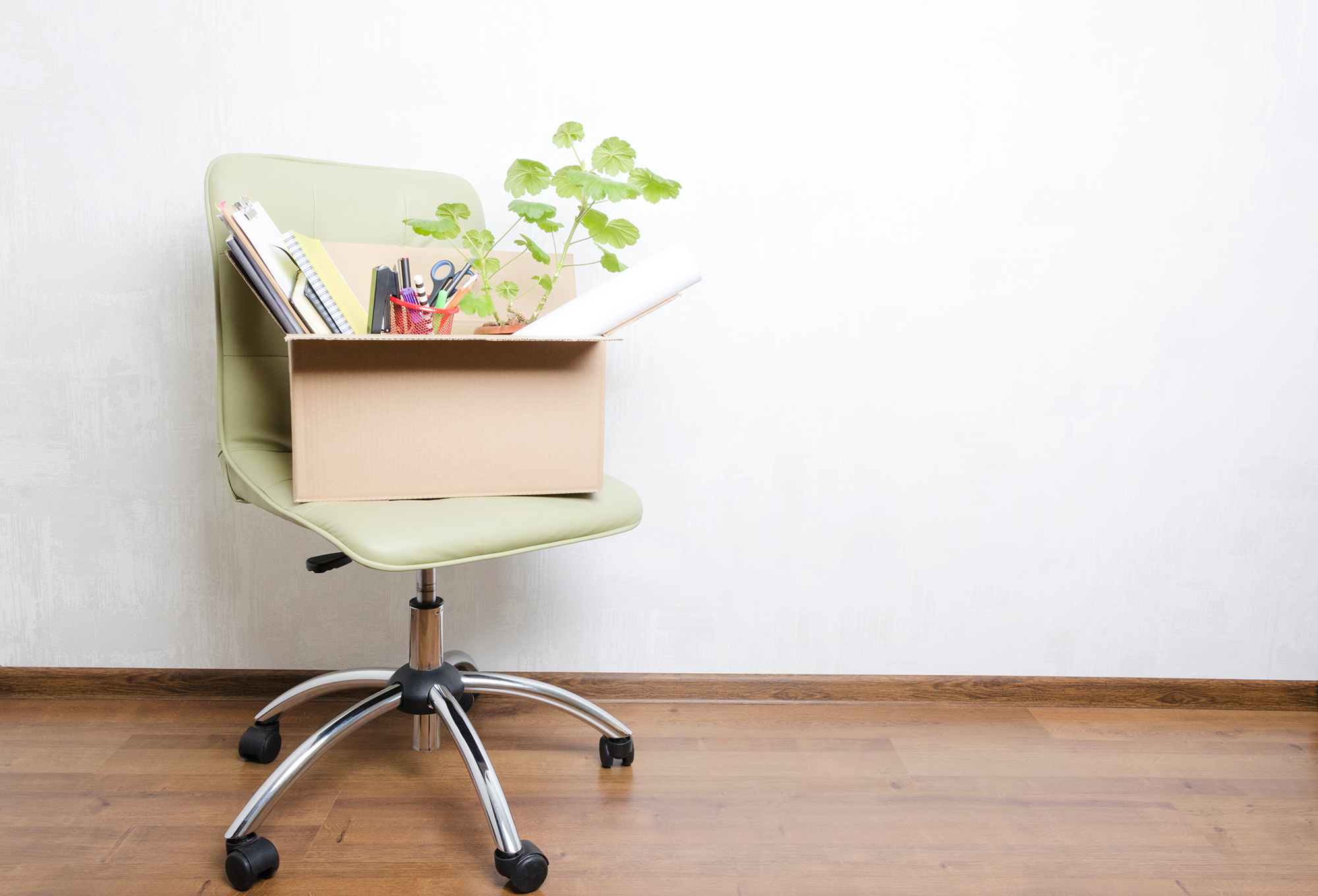 Chair with a box of items on it. (Image: Shutterstock)