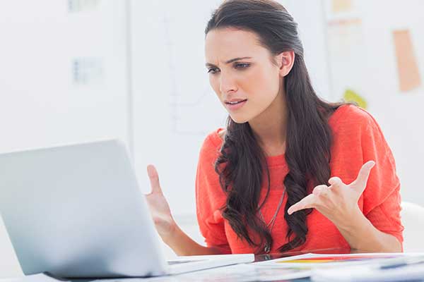 Frustrated woman waiting for a refund. (Image: Shutterstock)