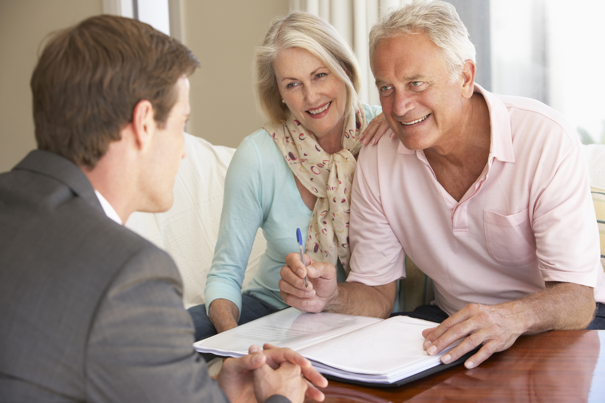 A couple getting financial advice. (Image: Shutterstock)