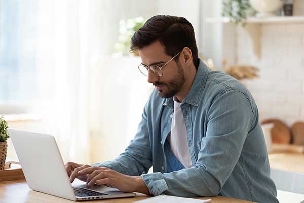 Man doing research online. (Image: Shutterstock)