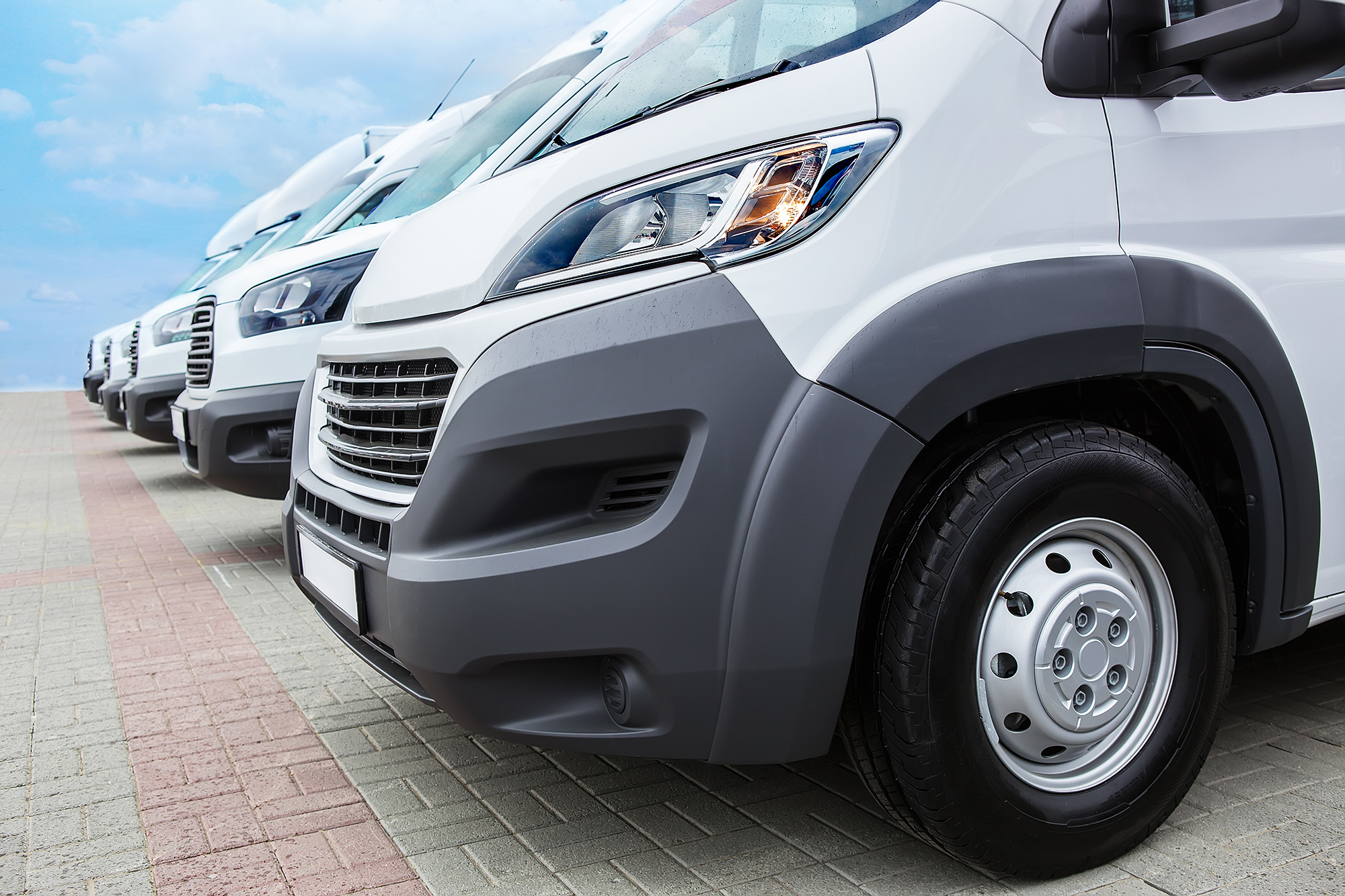 A row of vans. (Image: Shutterstock)