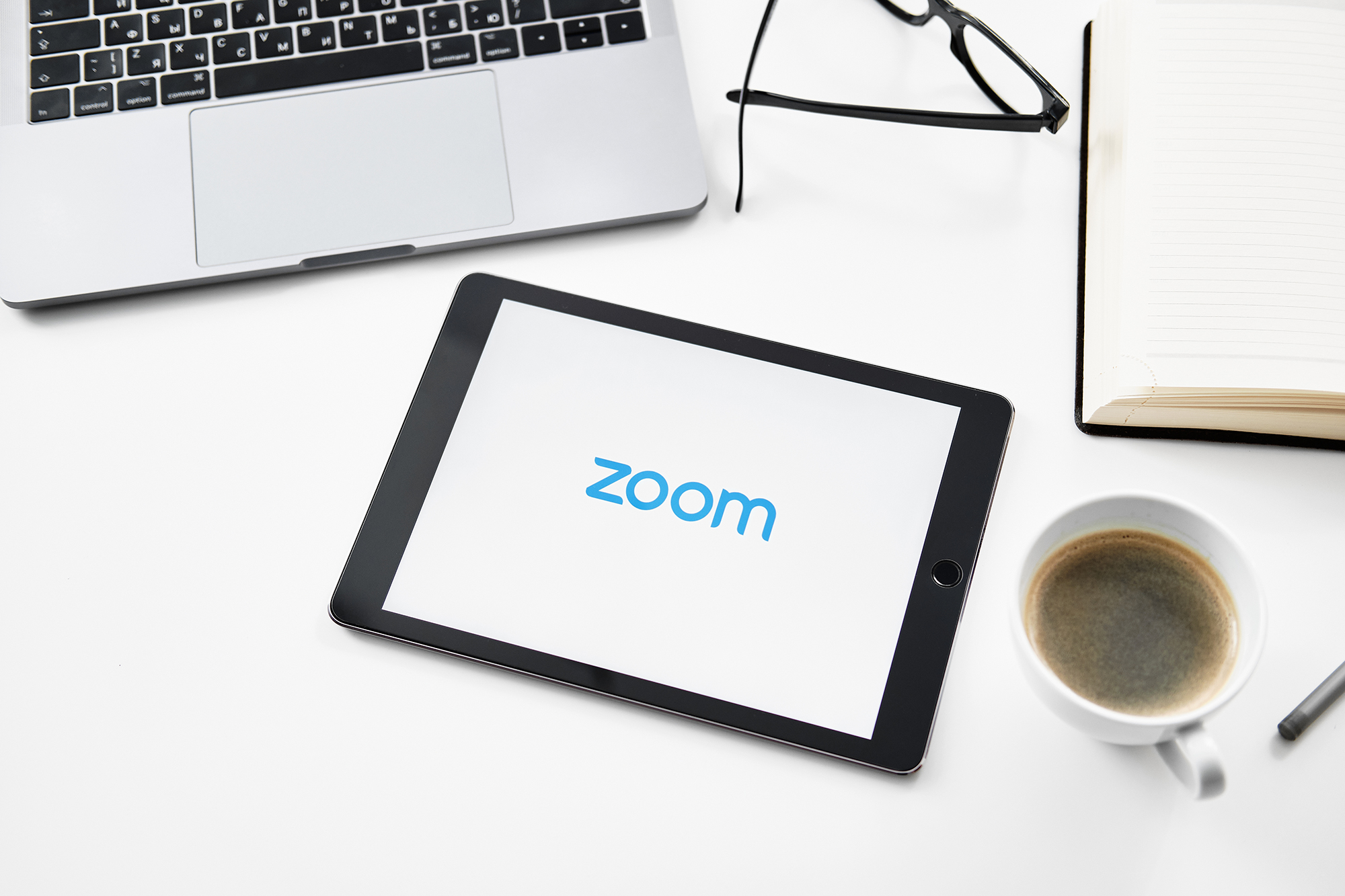 Zoom logo on tablet. (Image: soul_studio/Shutterstock)