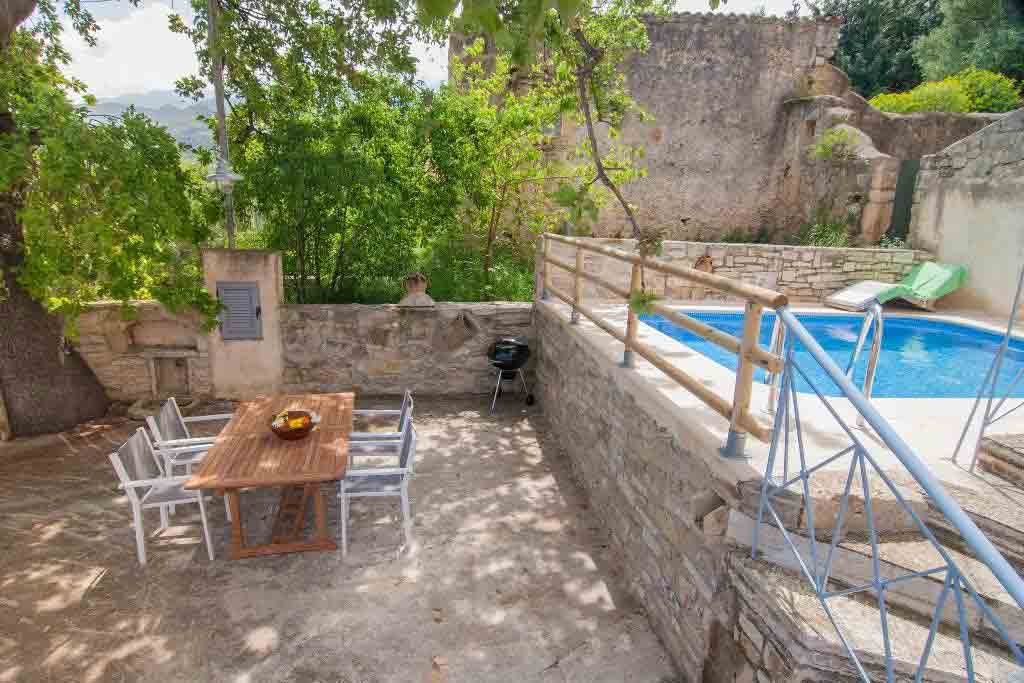 The swimming pool and dining terrace offer a private outdoor spot to enjoy the summer sun. Image: A Place in Crete / Rightmove